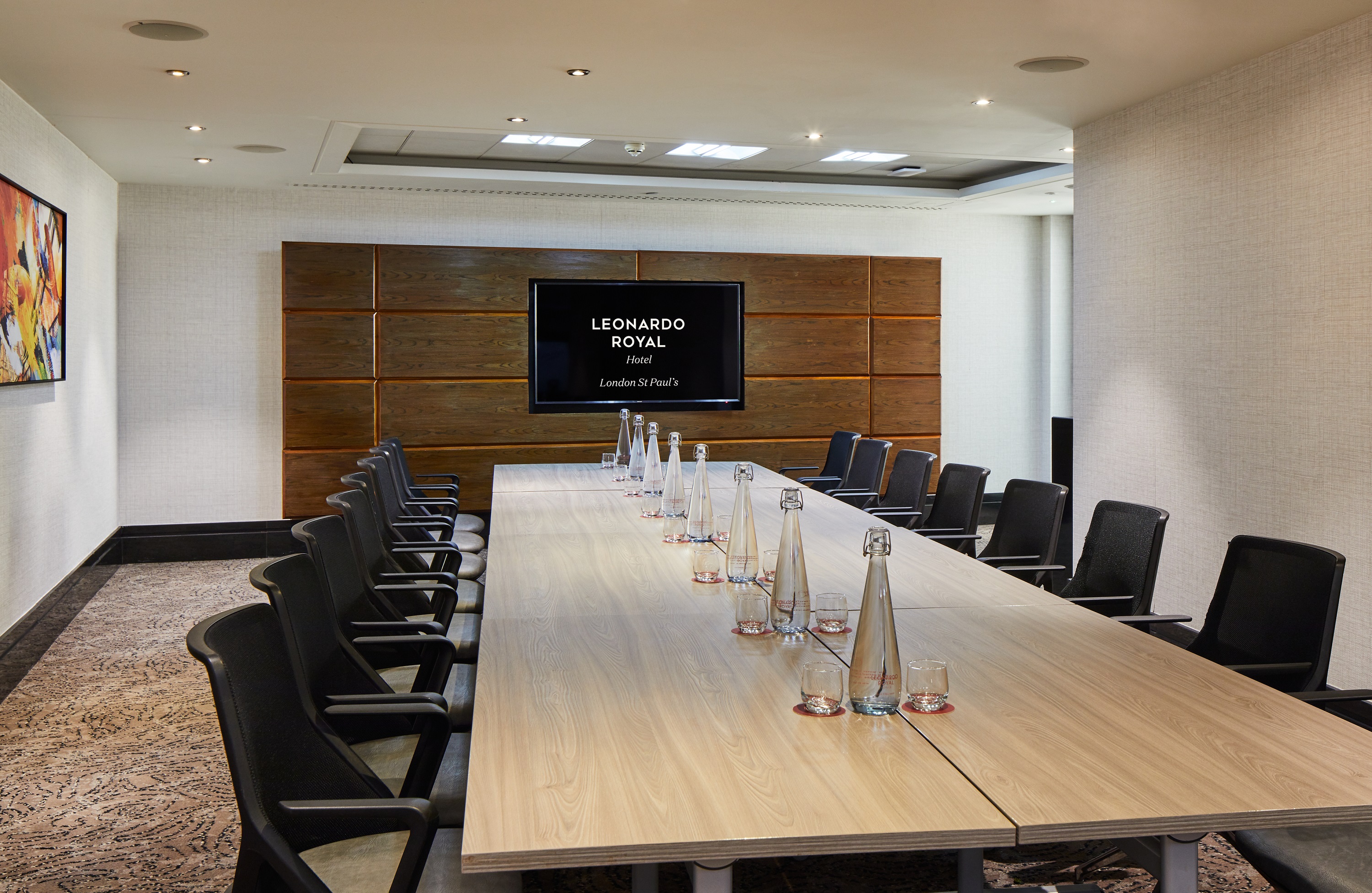 Modern Churchill Suite boardroom at Leonardo Royal Hotel London for corporate meetings.