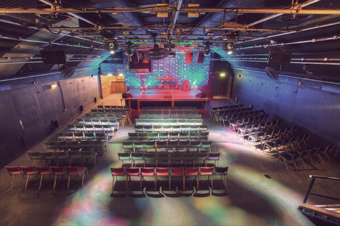 Versatile event space in Gorilla Manchester, set for a colorful performance.