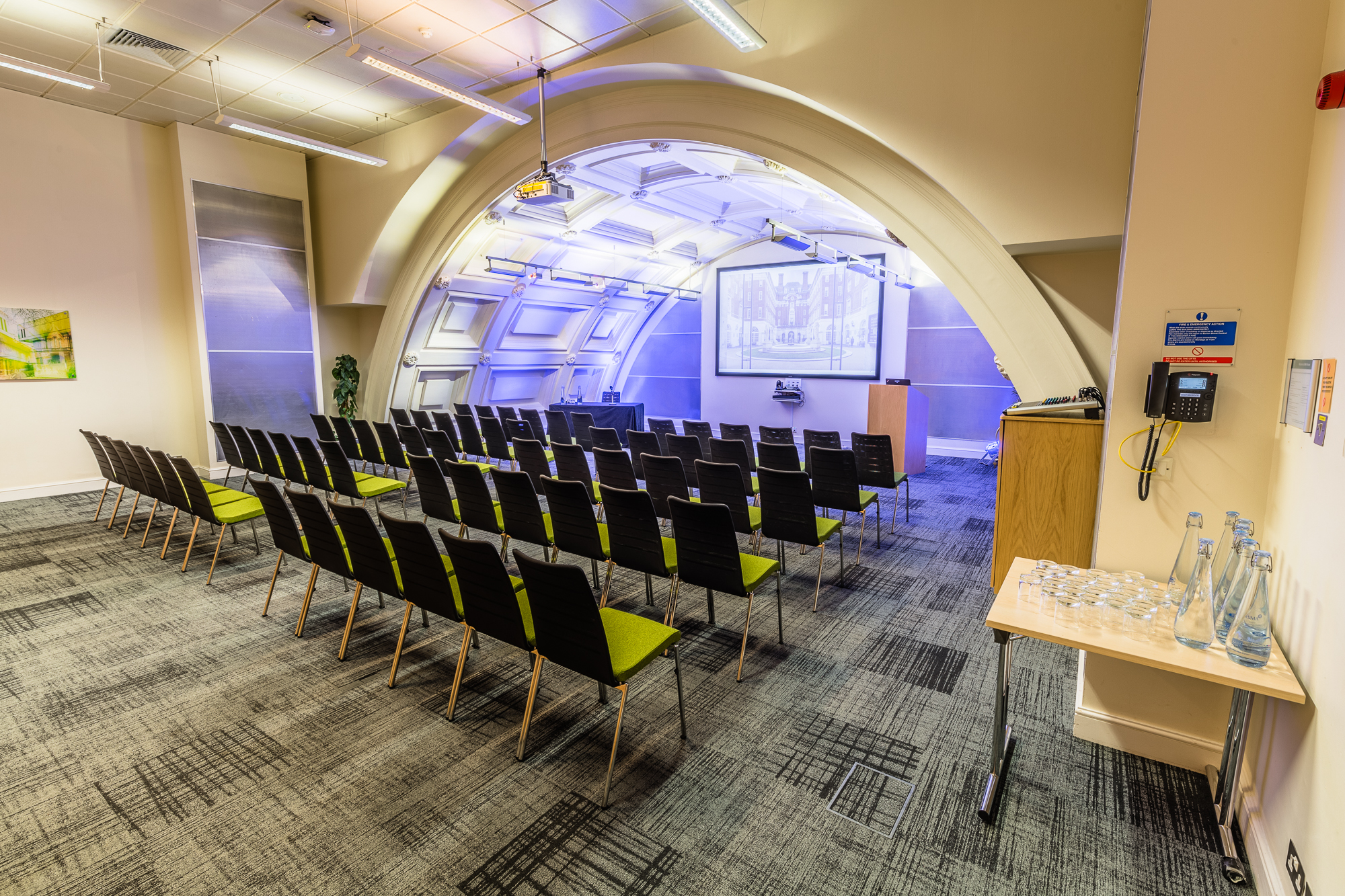 Black Room in BMA House, modern curved design for corporate meetings and workshops.