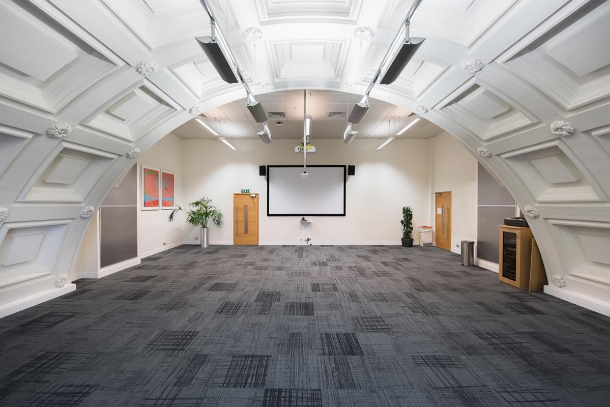 Spacious Harvey room in BMA House, ideal for meetings and workshops with arched ceiling. - Banner