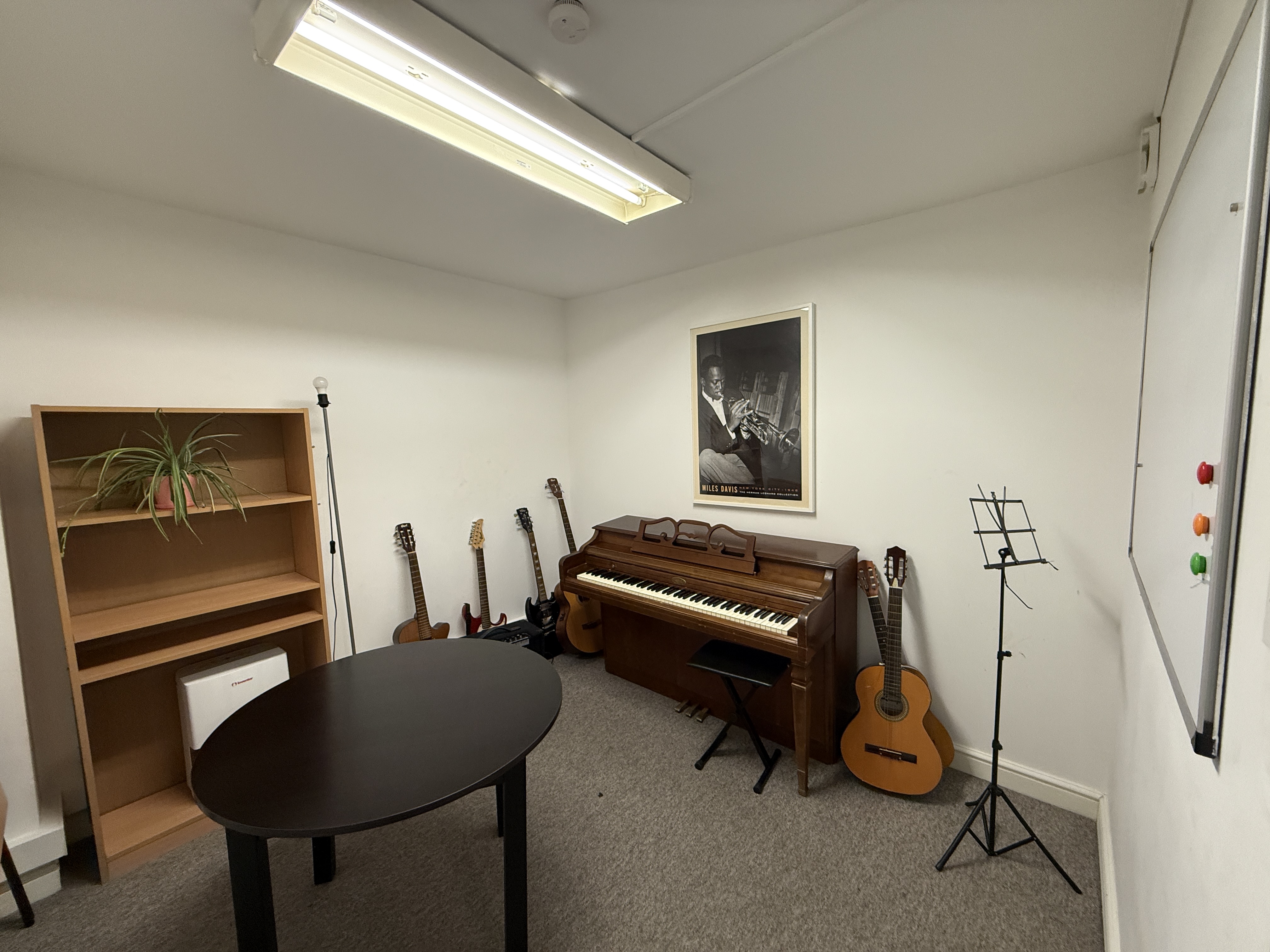 Small Music Rooms at artsHouse with piano, ideal for creative workshops and team-building.