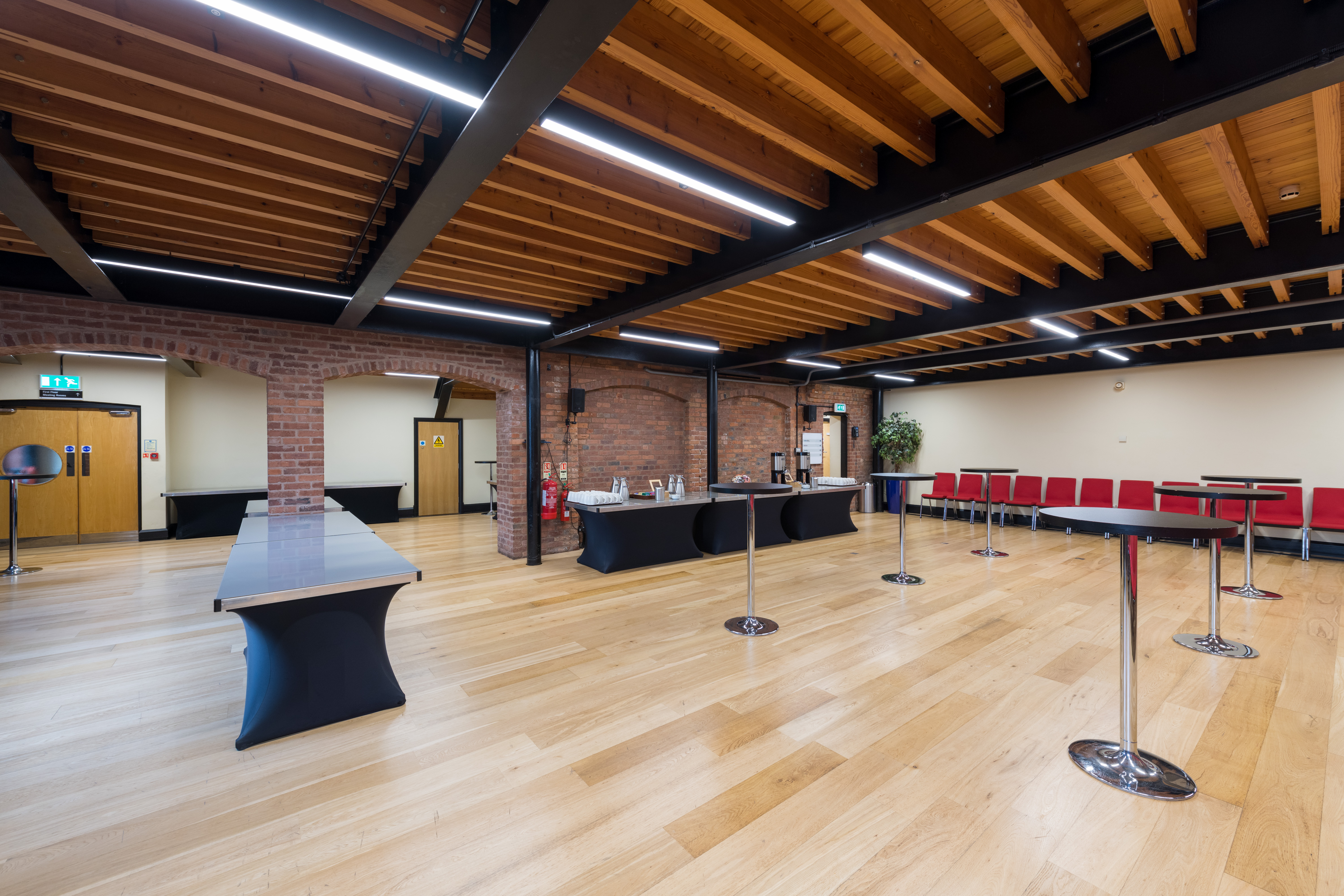 Waterside Room at IET Birmingham: Austin Court, versatile event space with wooden beams.