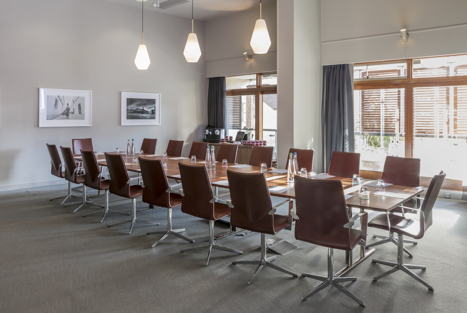 Frobisher Boardroom at Barbican Centre, modern meeting room with polished table and natural light.