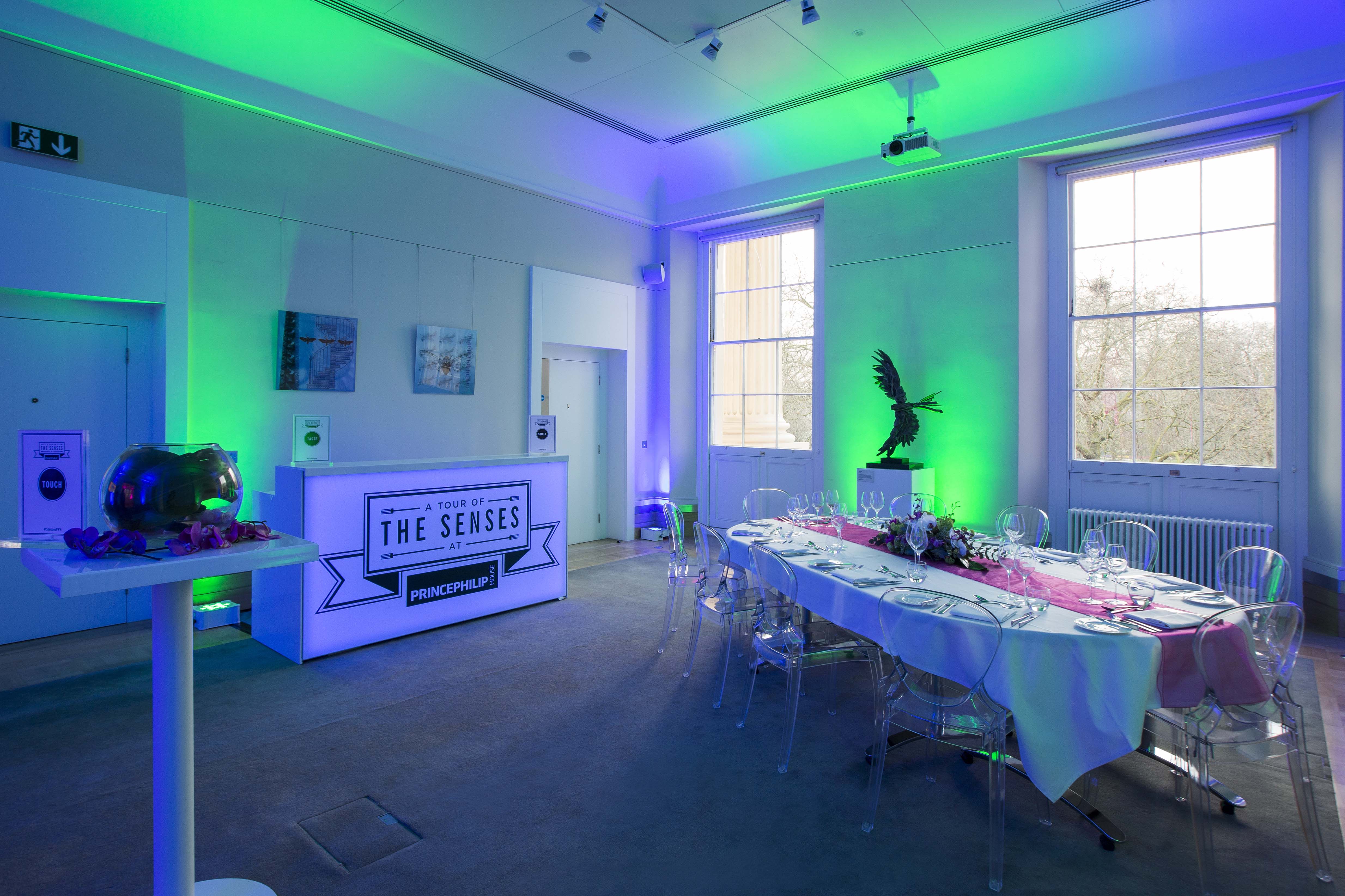 David Sainsbury at Prince Philip House, elegant dining setup for corporate events. - Banner