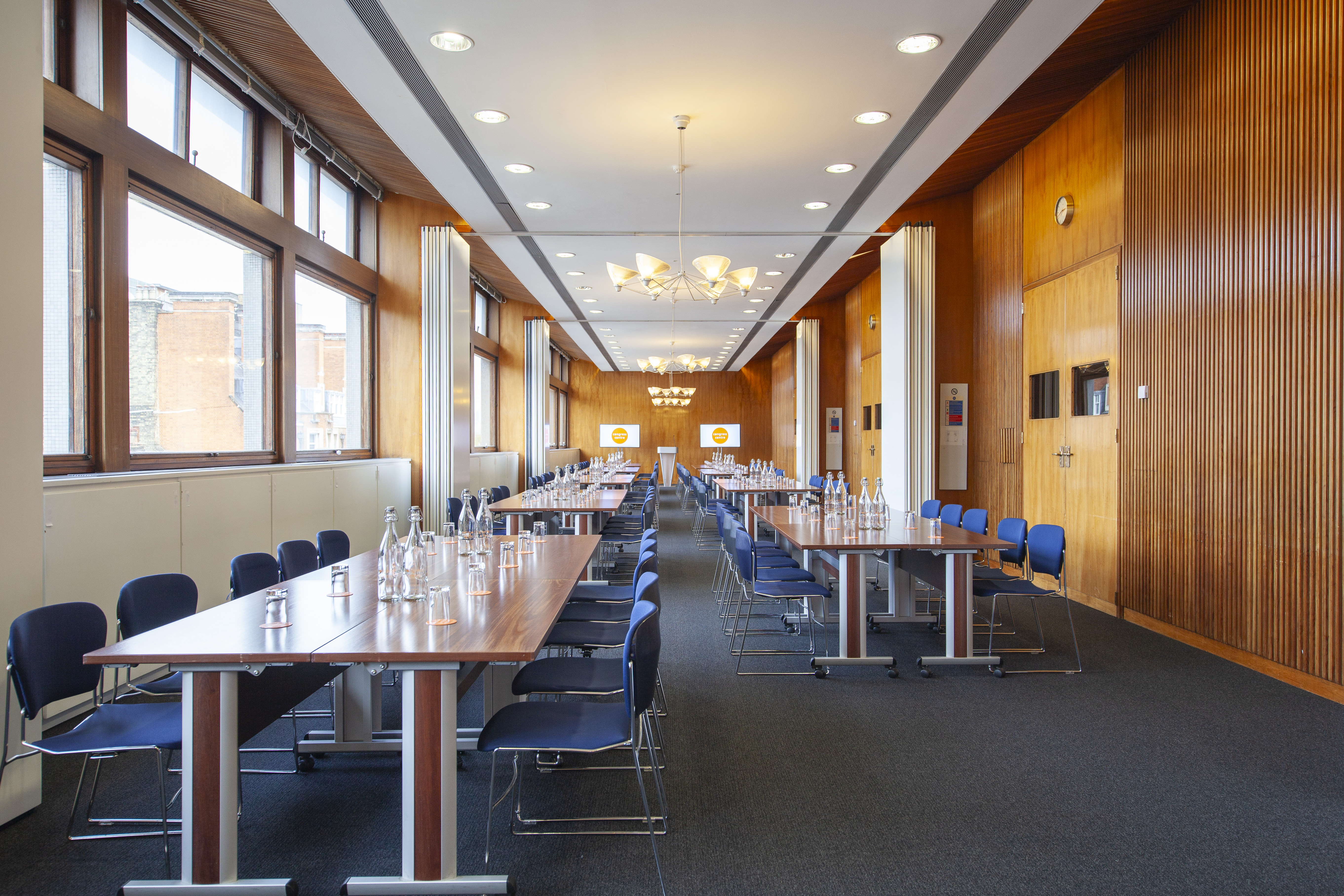 Modern meeting rooms with natural light, ideal for corporate events and workshops.