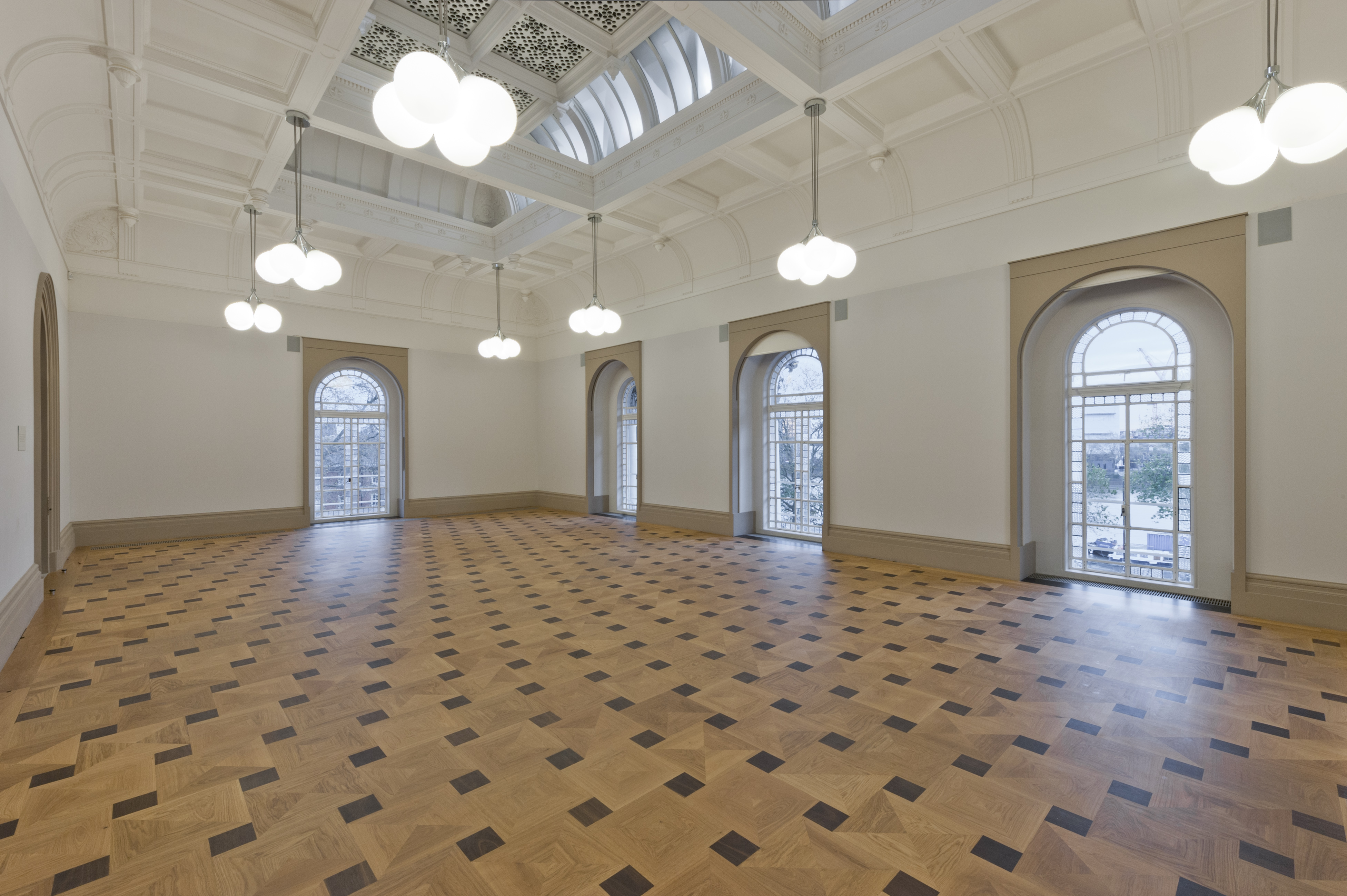 Grand Saloon at Tate Britain, spacious venue with elegant architecture for events.
