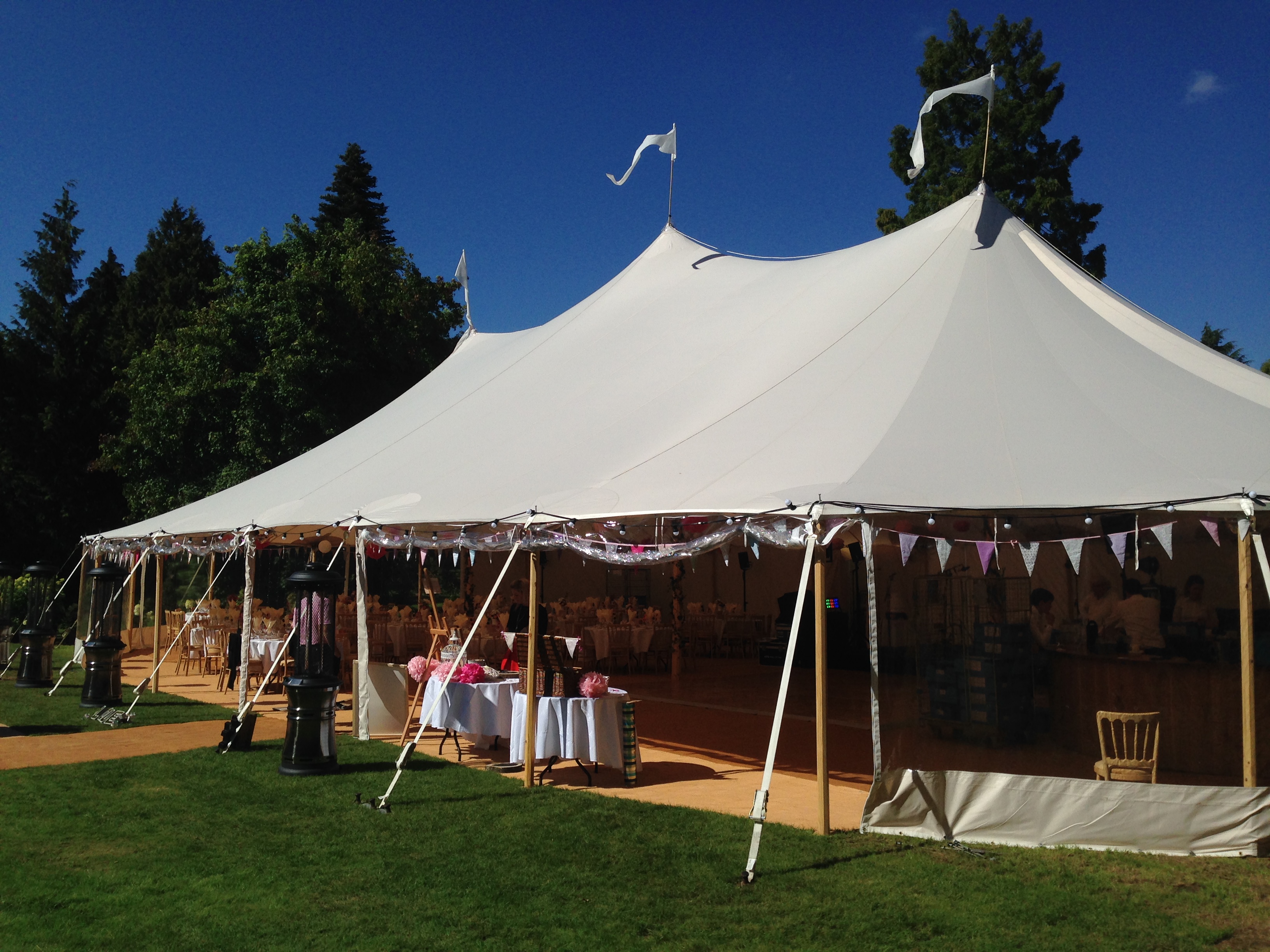 Elegant outdoor event tent at RHS Garden Wisley, ideal for weddings and corporate gatherings.
