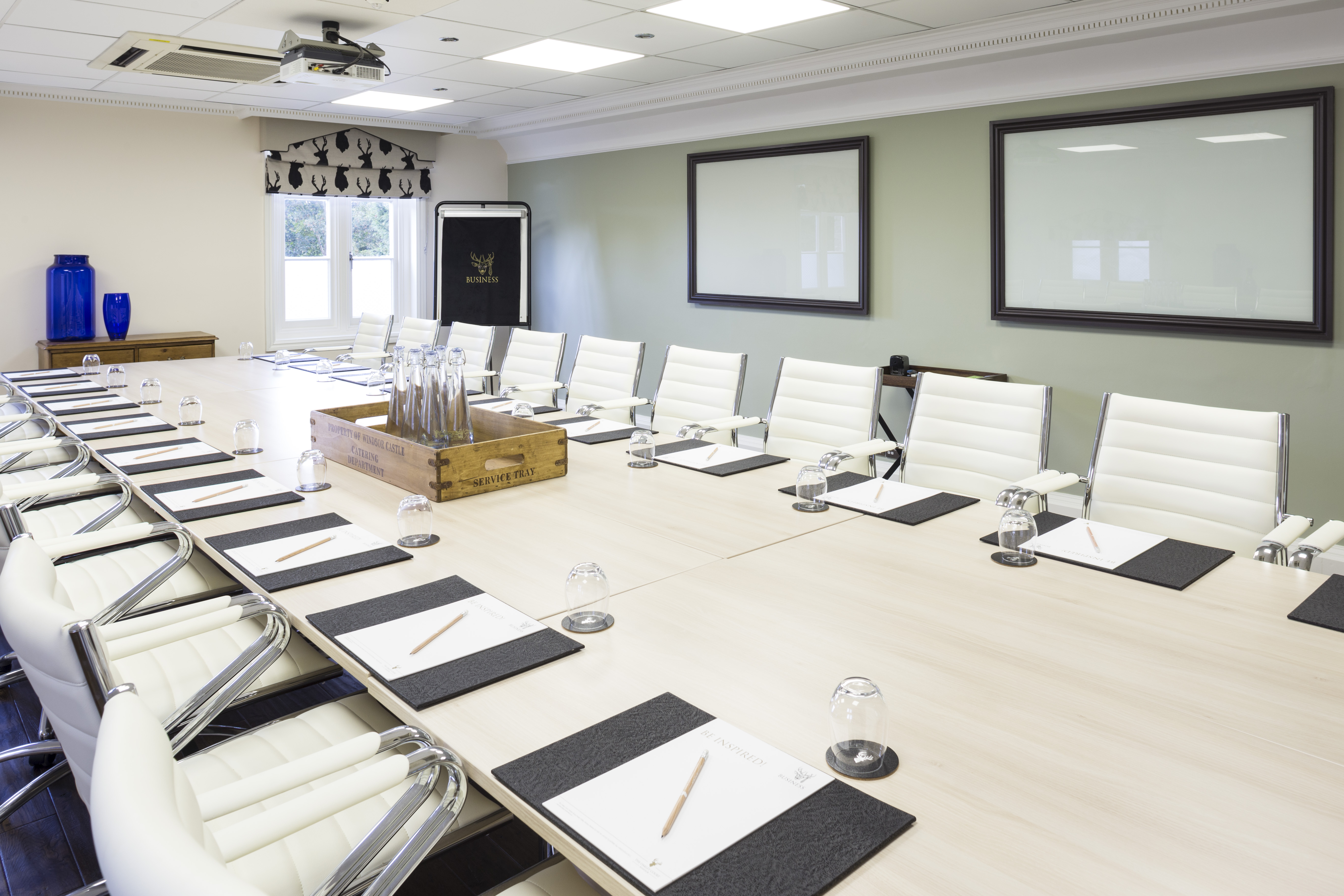 Modern conference room in Richmond Suite, ideal for meetings and presentations.