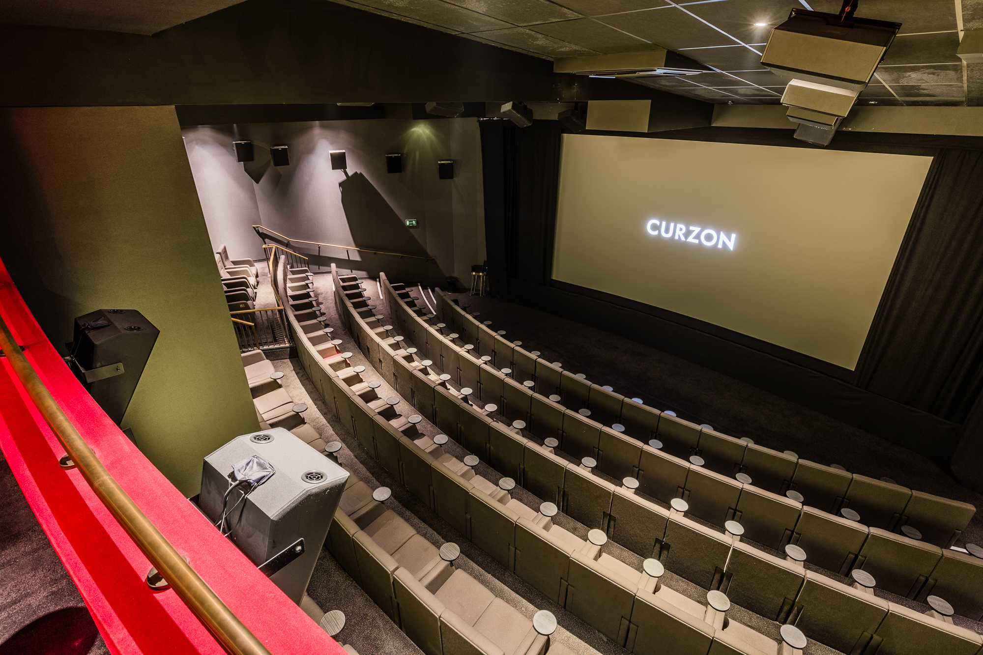 Modern tiered cinema with sleek seating for exclusive screenings at Curzon Bloomsbury.