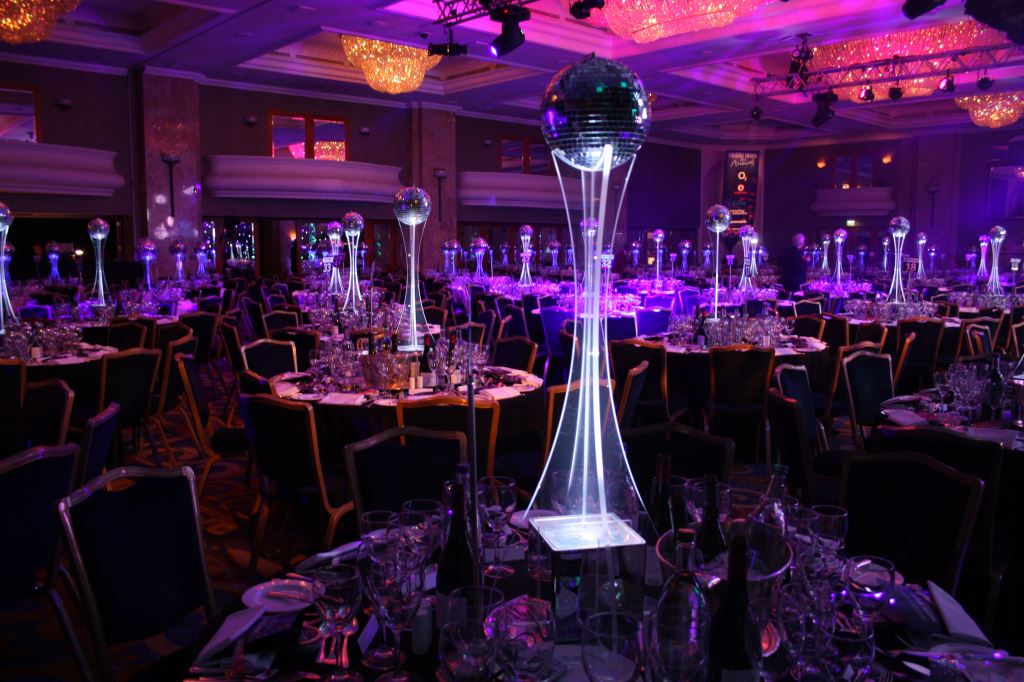 Grand Ballroom at London Hilton: elegant tables, modern lighting for formal events. - Banner