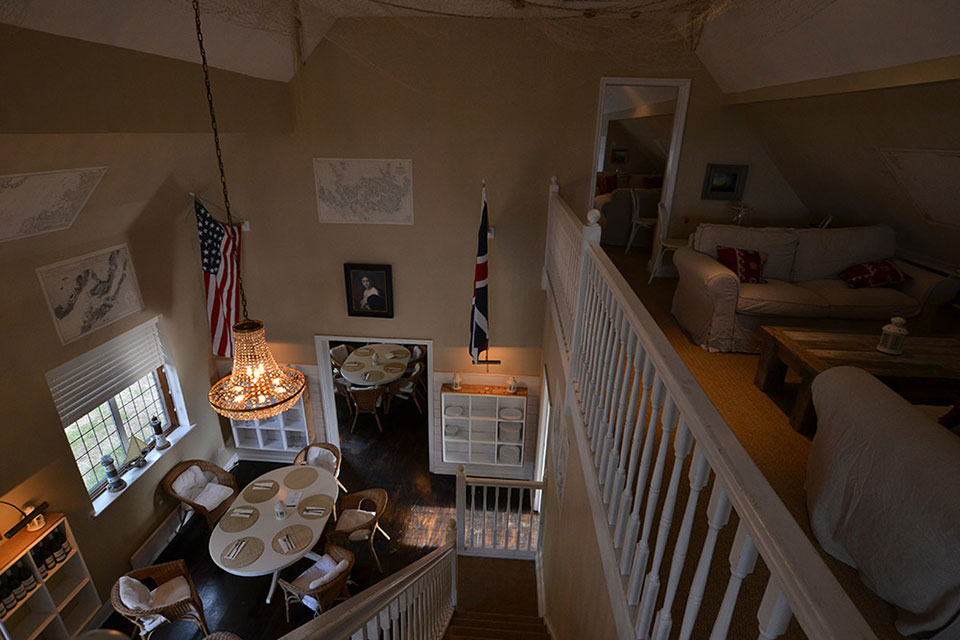 Charming multi-level event space at The Club House, Osea Island for gatherings and meetings.