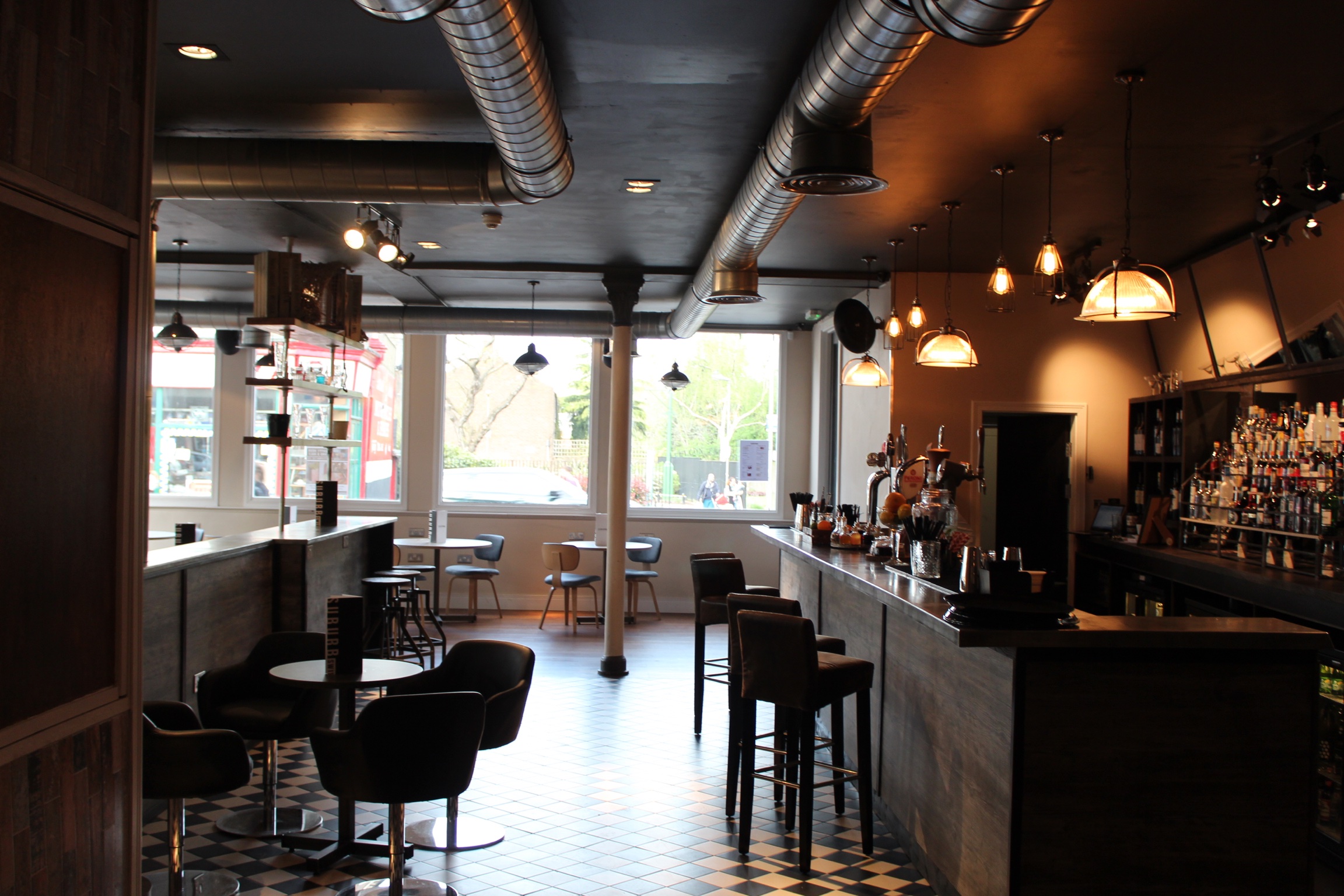 Modern venue in SW11 with warm lighting, perfect for networking events and gatherings.