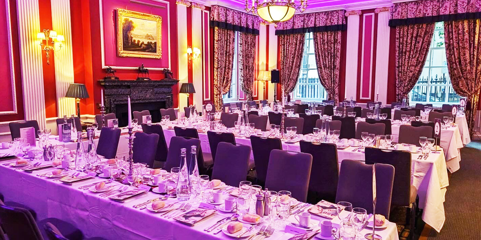 Morrison Room gala dinner, plush purple seating