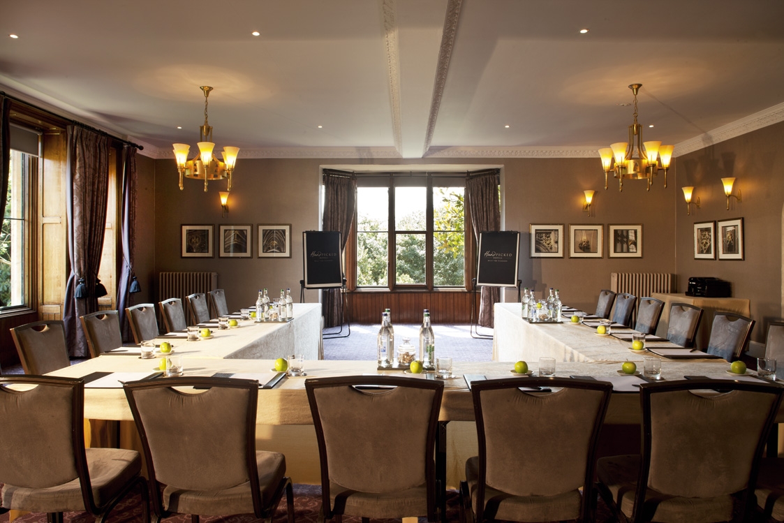Fielden Suite at Nutfield Priory: elegant meeting room with U-shaped tables for events.