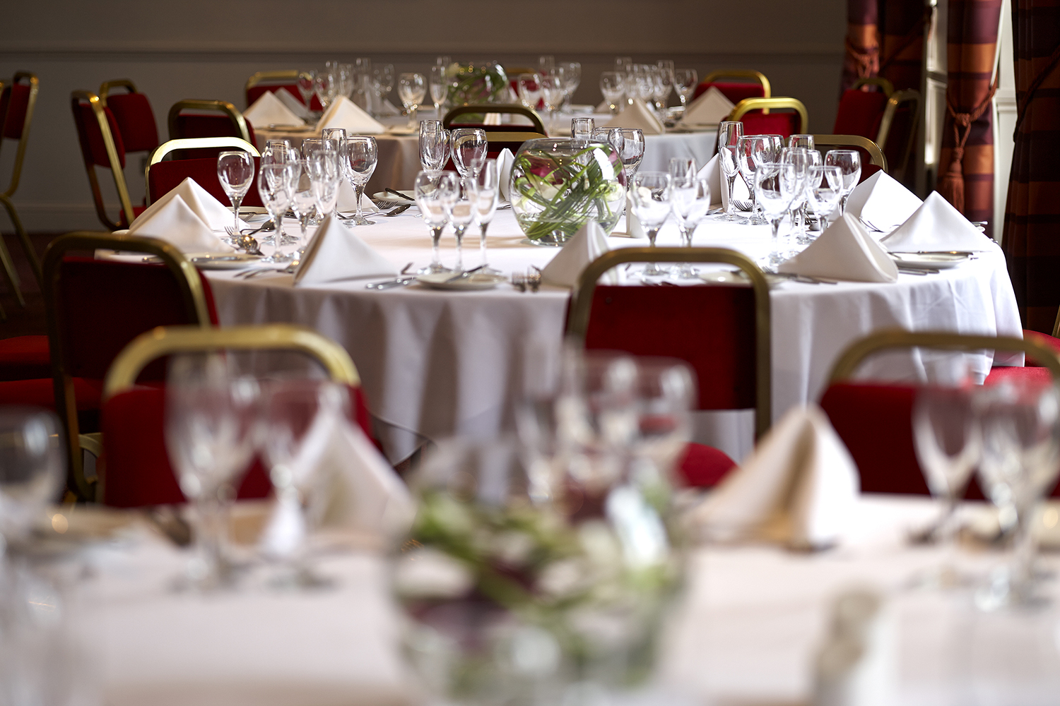 Elegant Princess Suite dining area with round tables, perfect for weddings and corporate events.