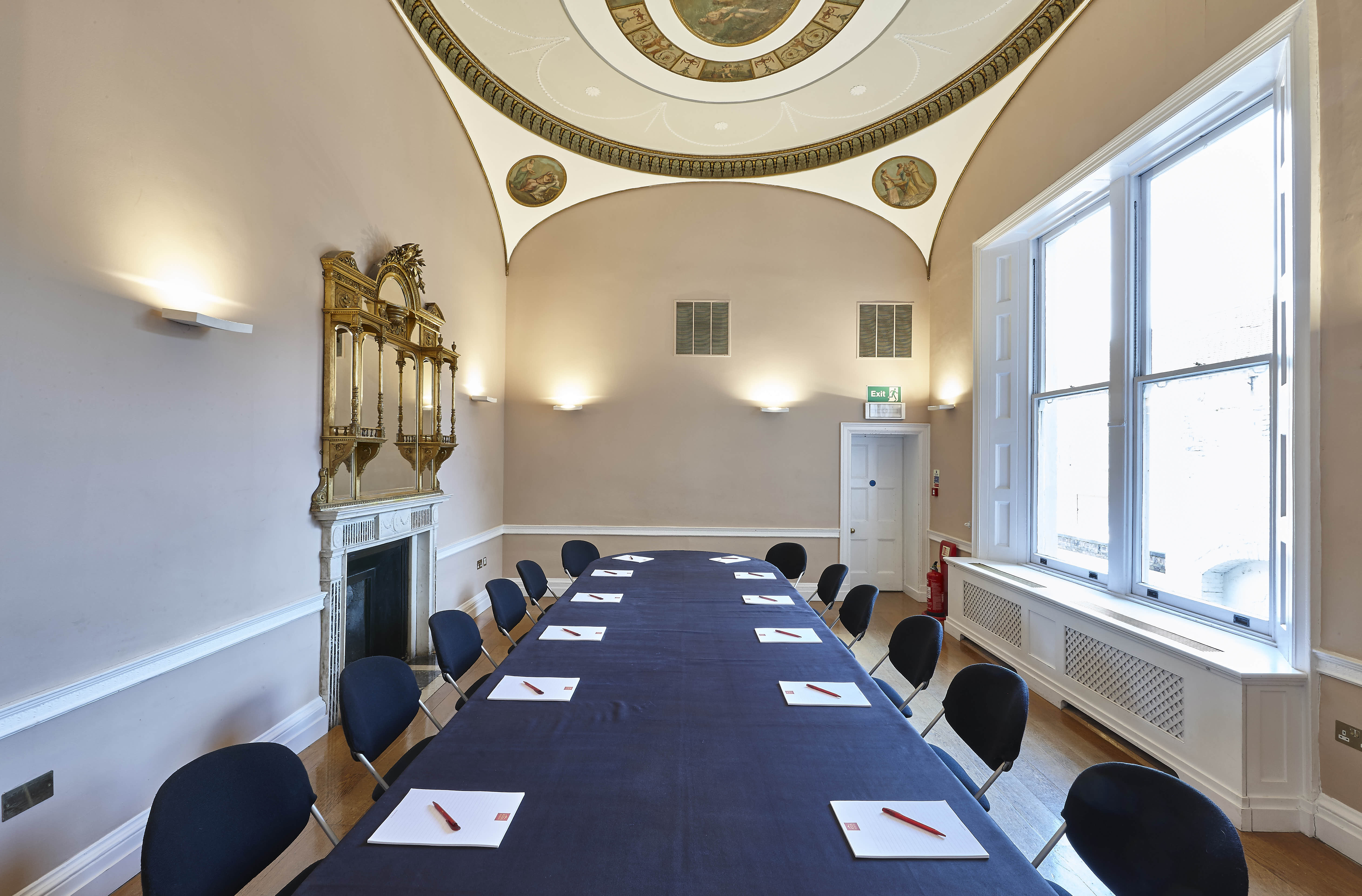 Meeting room with elegant decor, ideal for corporate events and presentations.