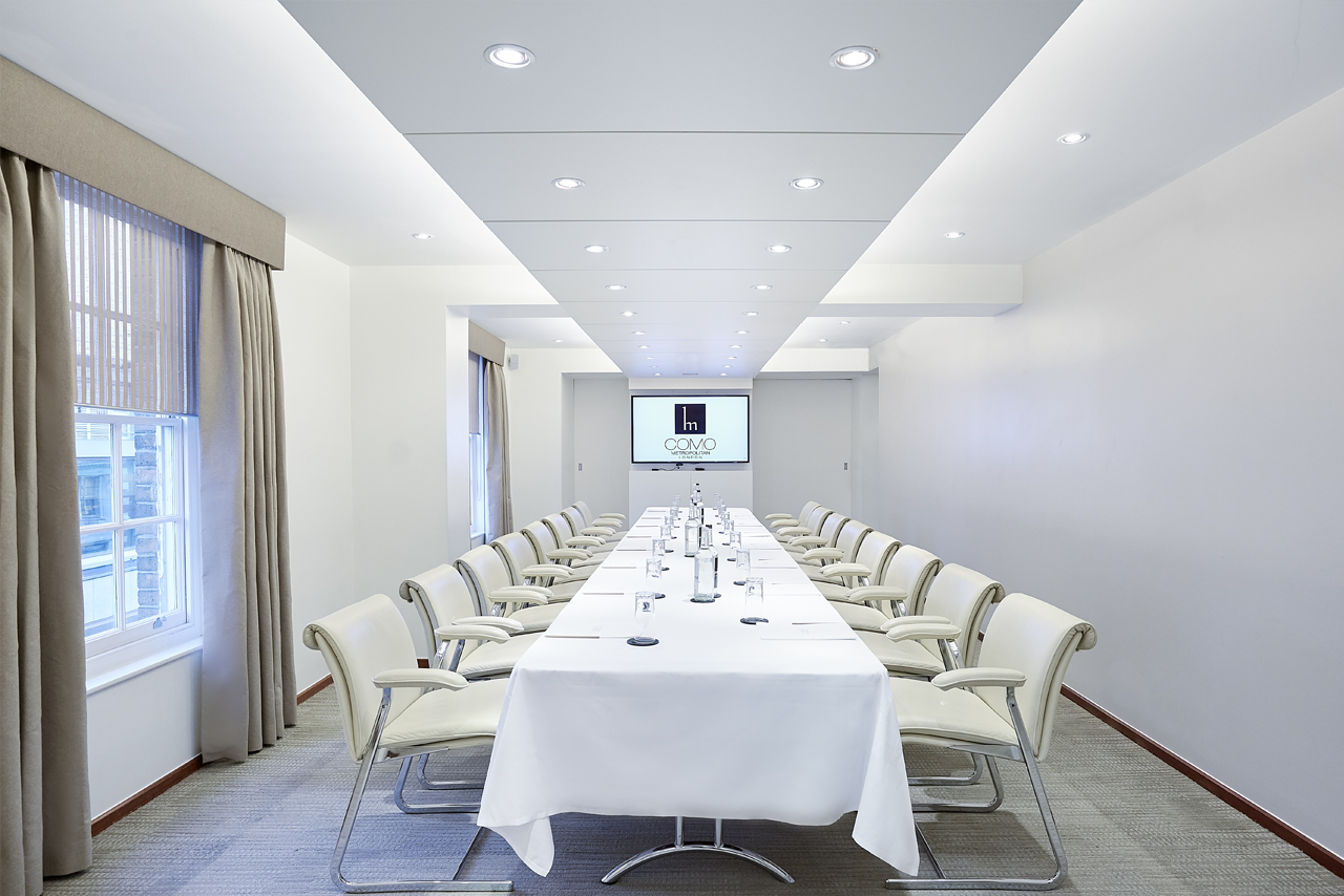 Modern meeting room at COMO Metropolitan London, ideal for corporate events and workshops.