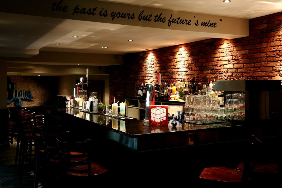 Stylish bar setup at The Liquor Store Deansgate for networking events and gatherings.