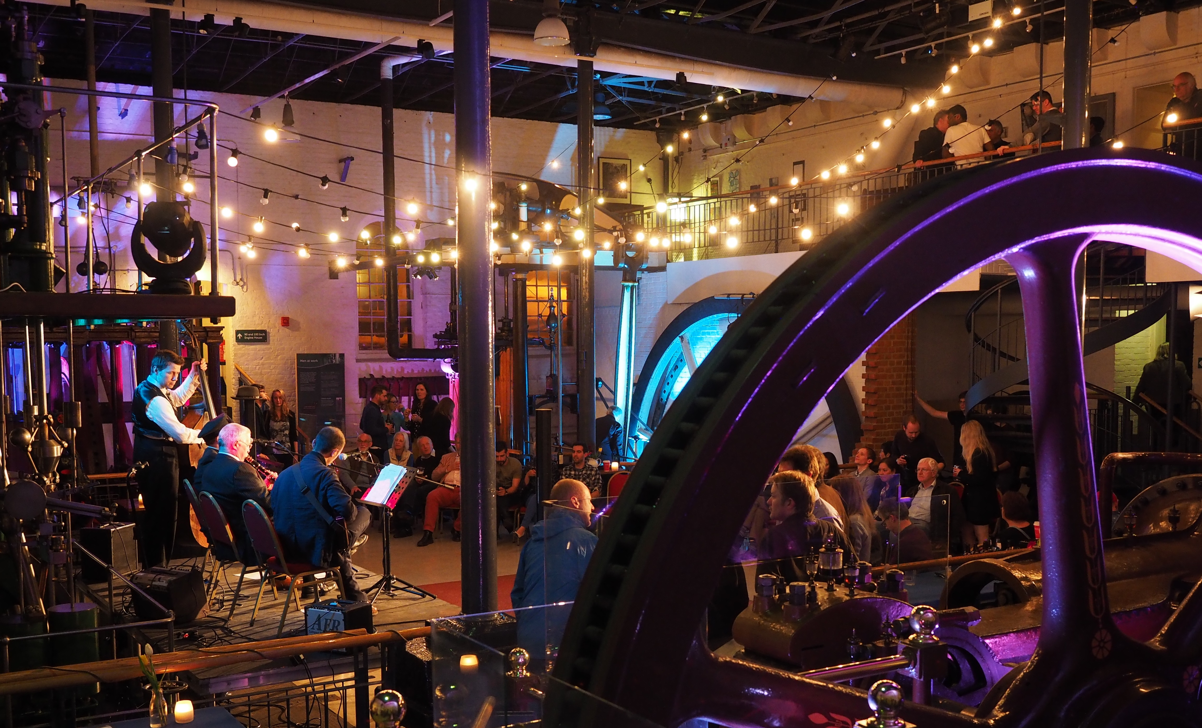 Steam Hall event space in London, featuring warm lighting for networking and gatherings.