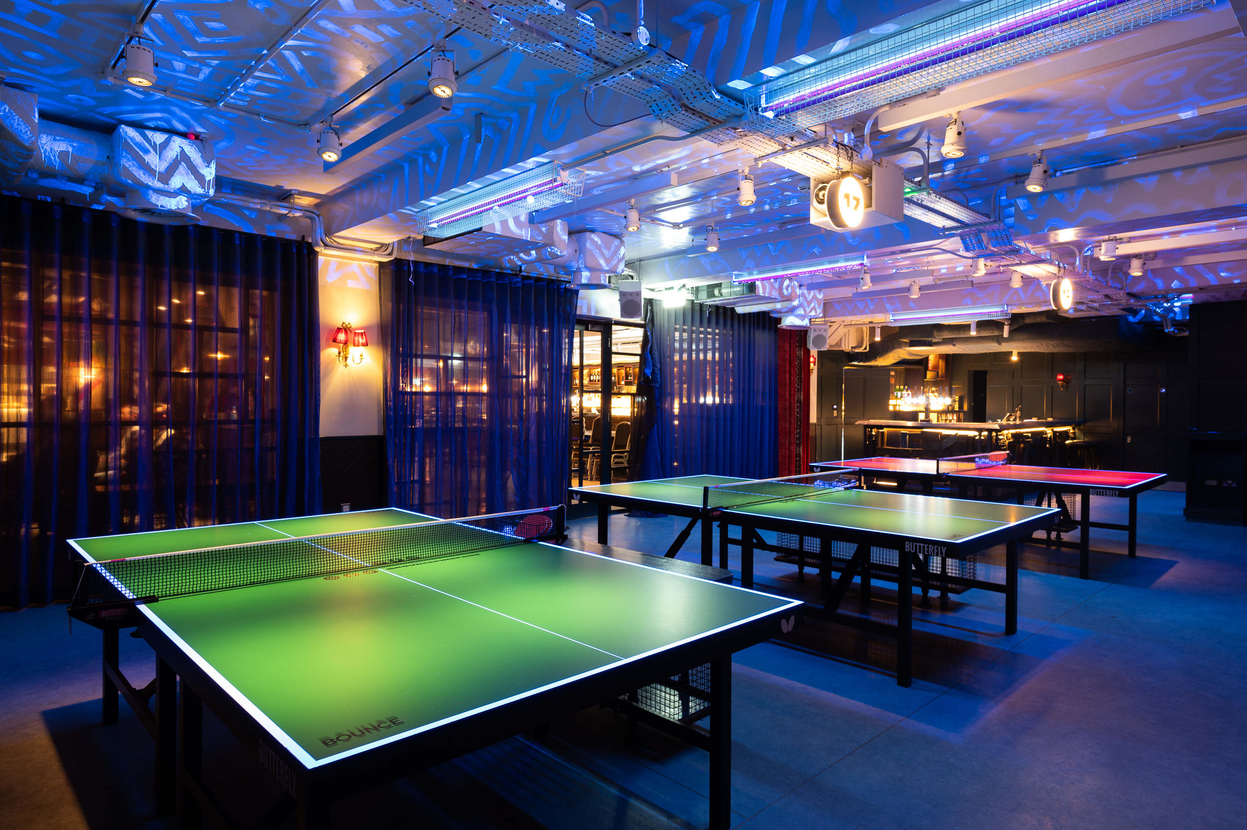 Private event room with ping pong tables for corporate gatherings in Shoreditch. - Banner