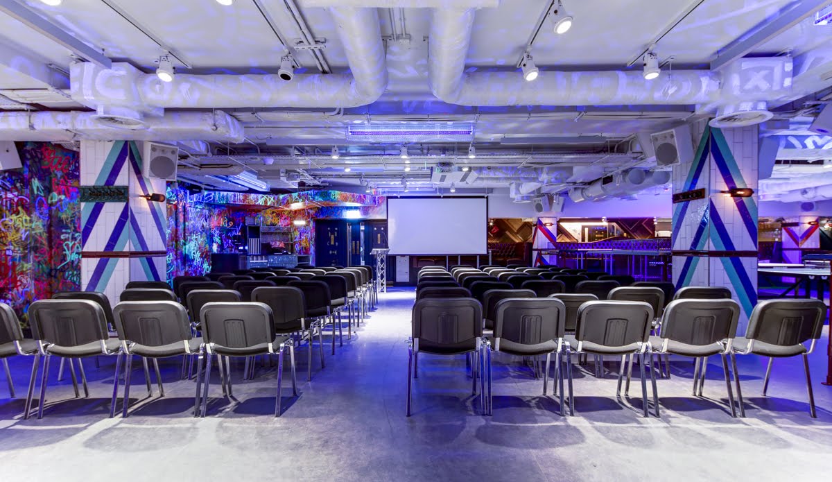 Versatile event space at Bounce Old Street, featuring vibrant decor for presentations.