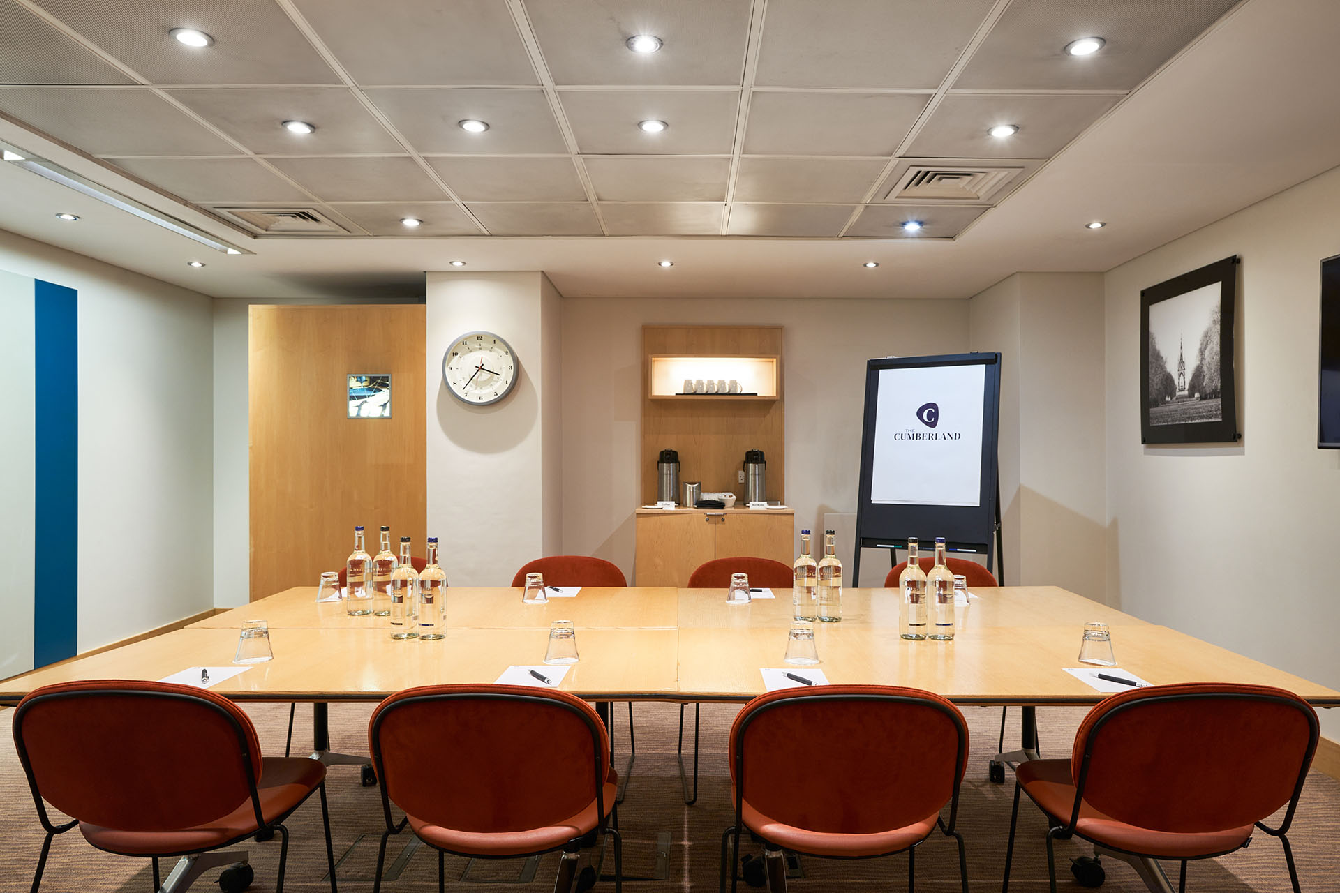 Meeting room at The Cumberland Hotel, featuring a spacious table for professional gatherings.