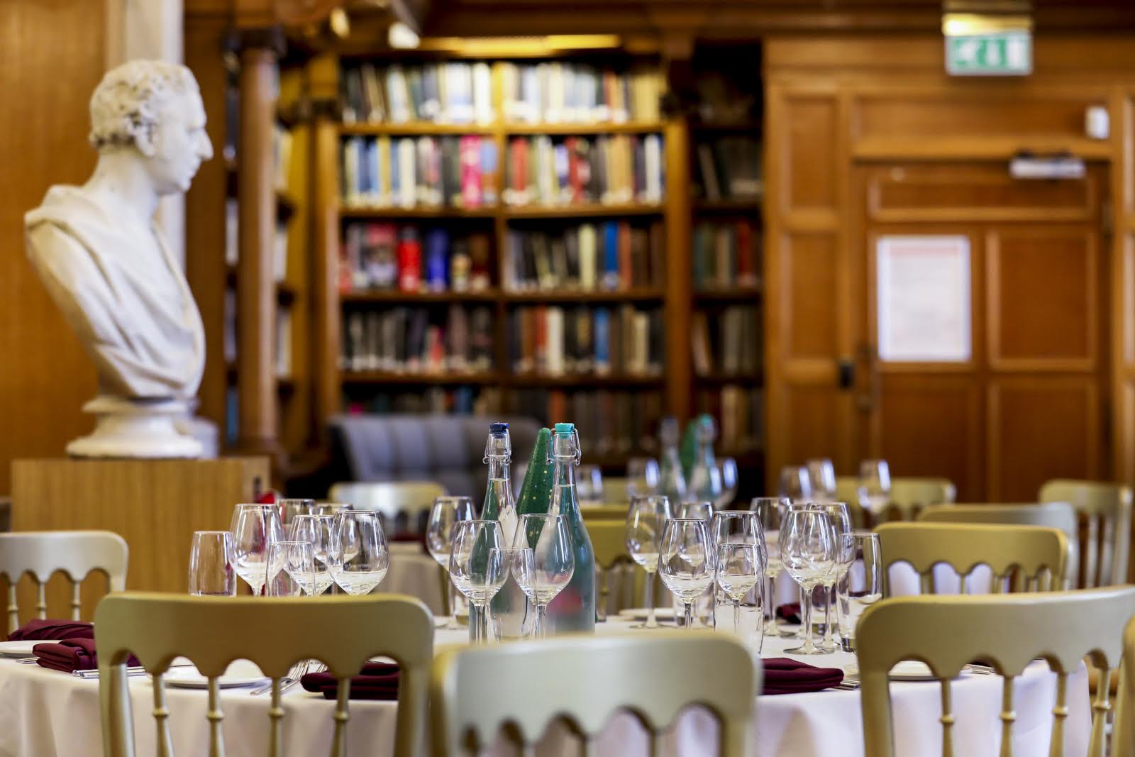 Elegant dining setup in Library at One Birdcage Walk for corporate events and gatherings. - Banner
