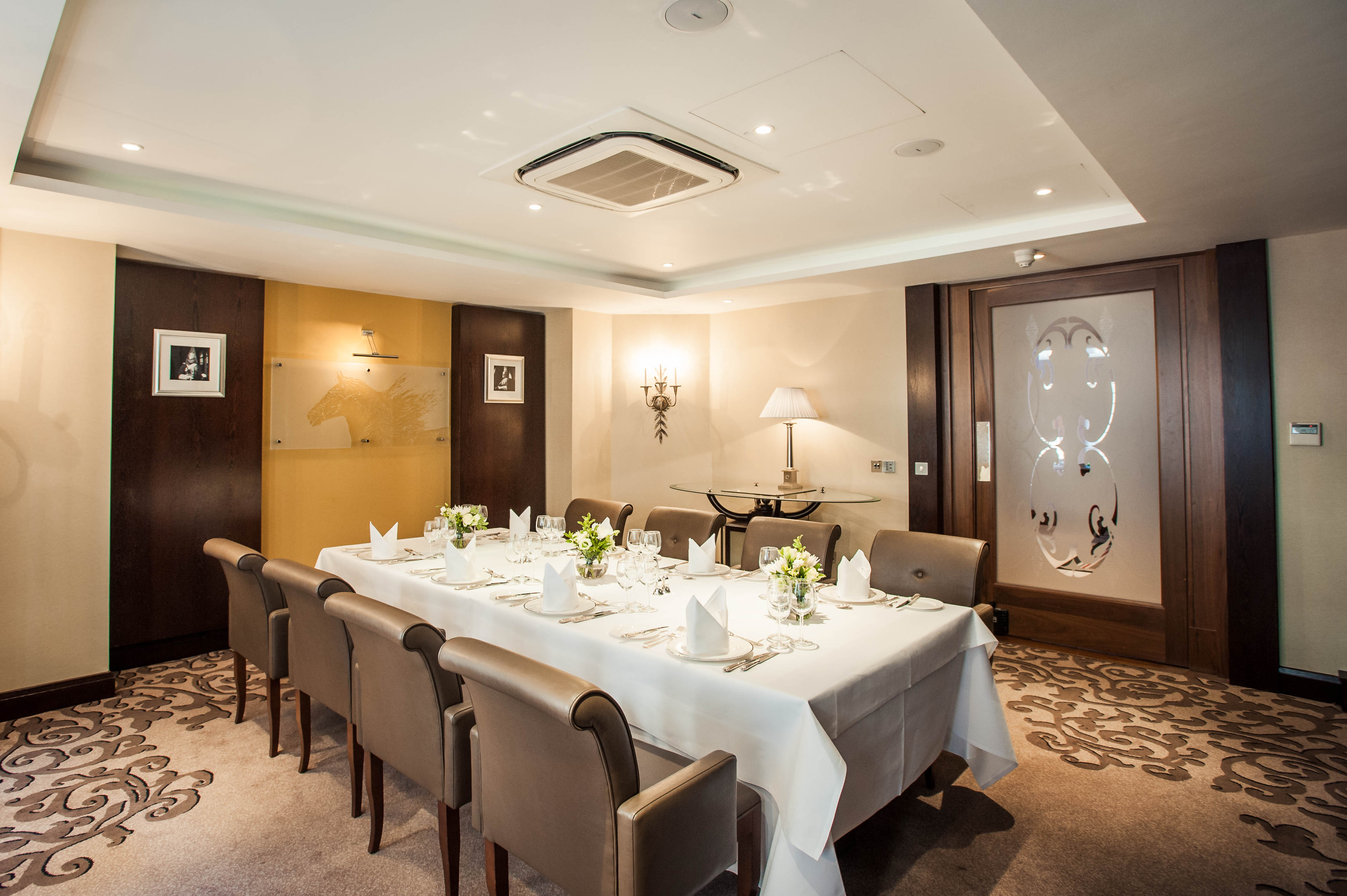 Executive Boardroom at The Royal Horseguards Hotel, elegant setup for private meetings.