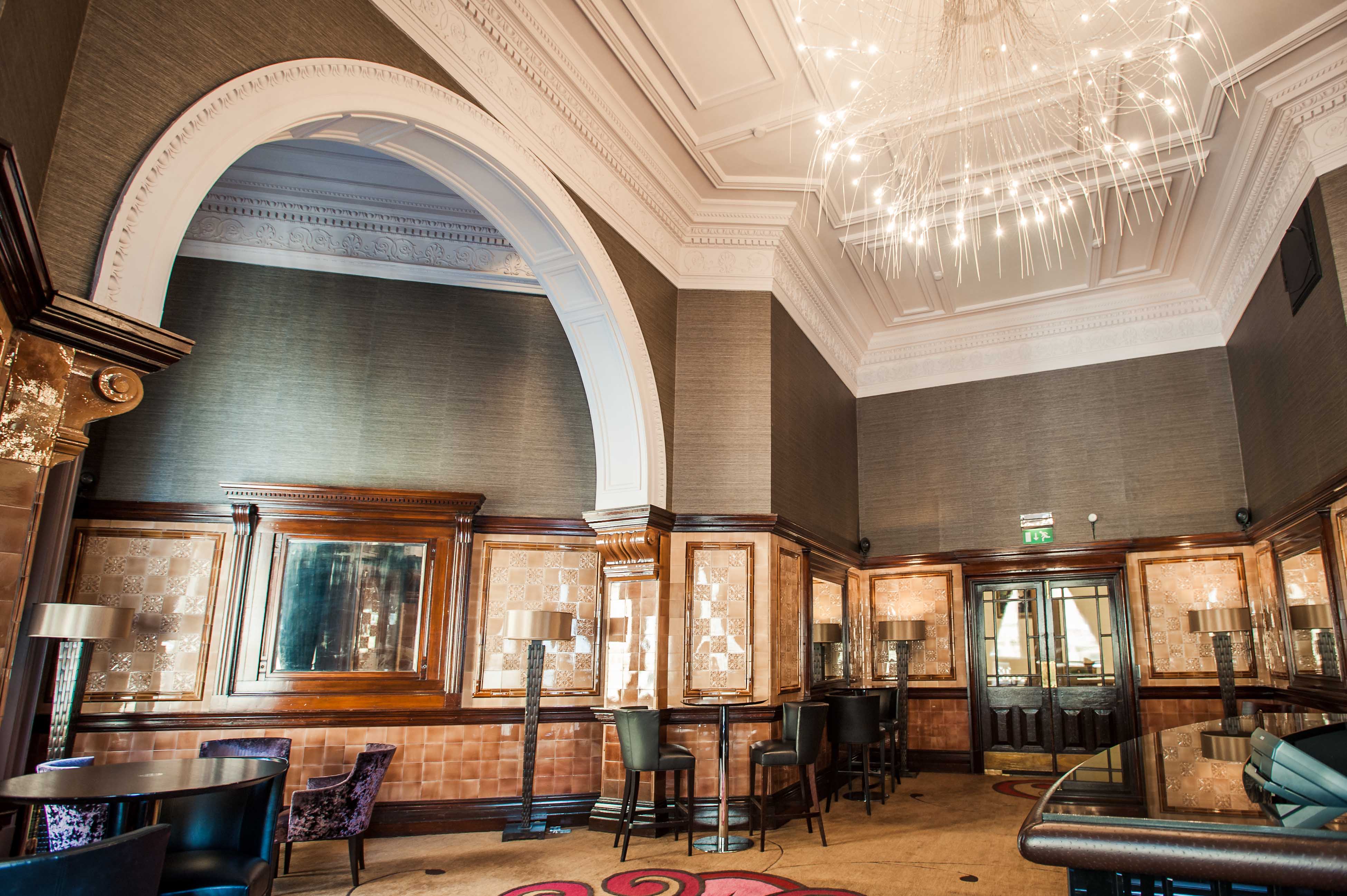 Churchill's Bar: elegant event space with high ceilings for upscale meetings and gatherings.