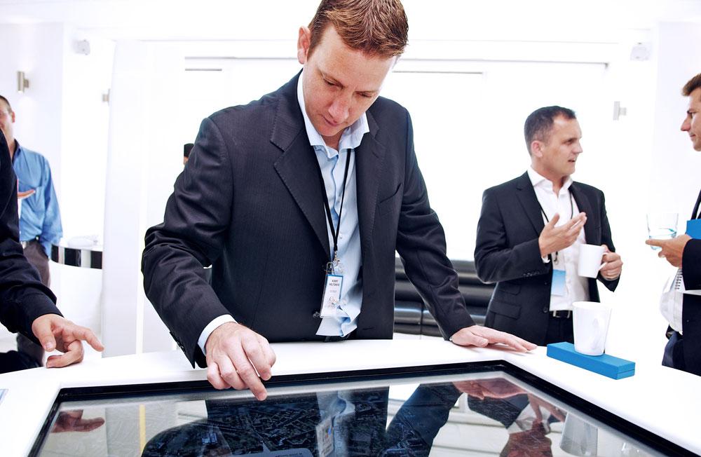 Professionals discussing at Altitude 360, a corporate event venue in London.