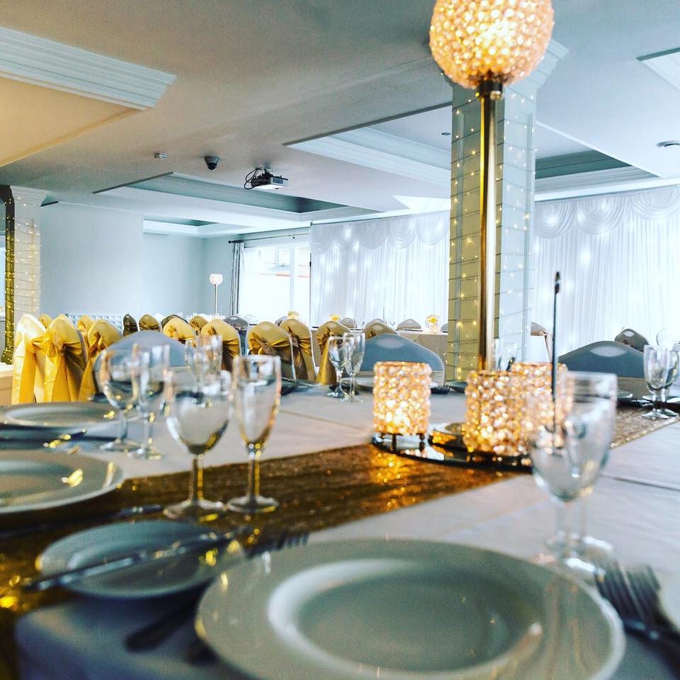Elegant banquet setup with sparkling centerpieces at Spinnaker Function Suite, ideal for weddings.