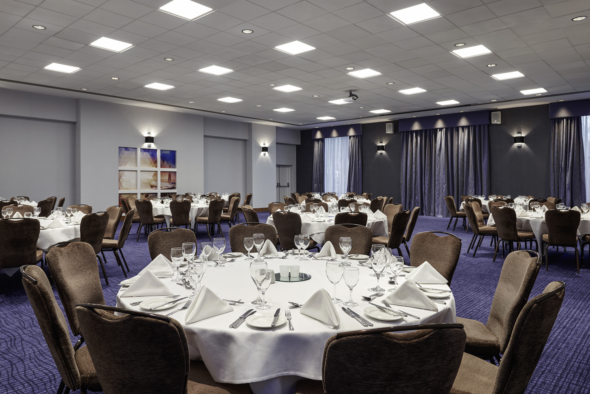 Albury Suite at Novotel London Stansted: elegant banquet hall for corporate events.