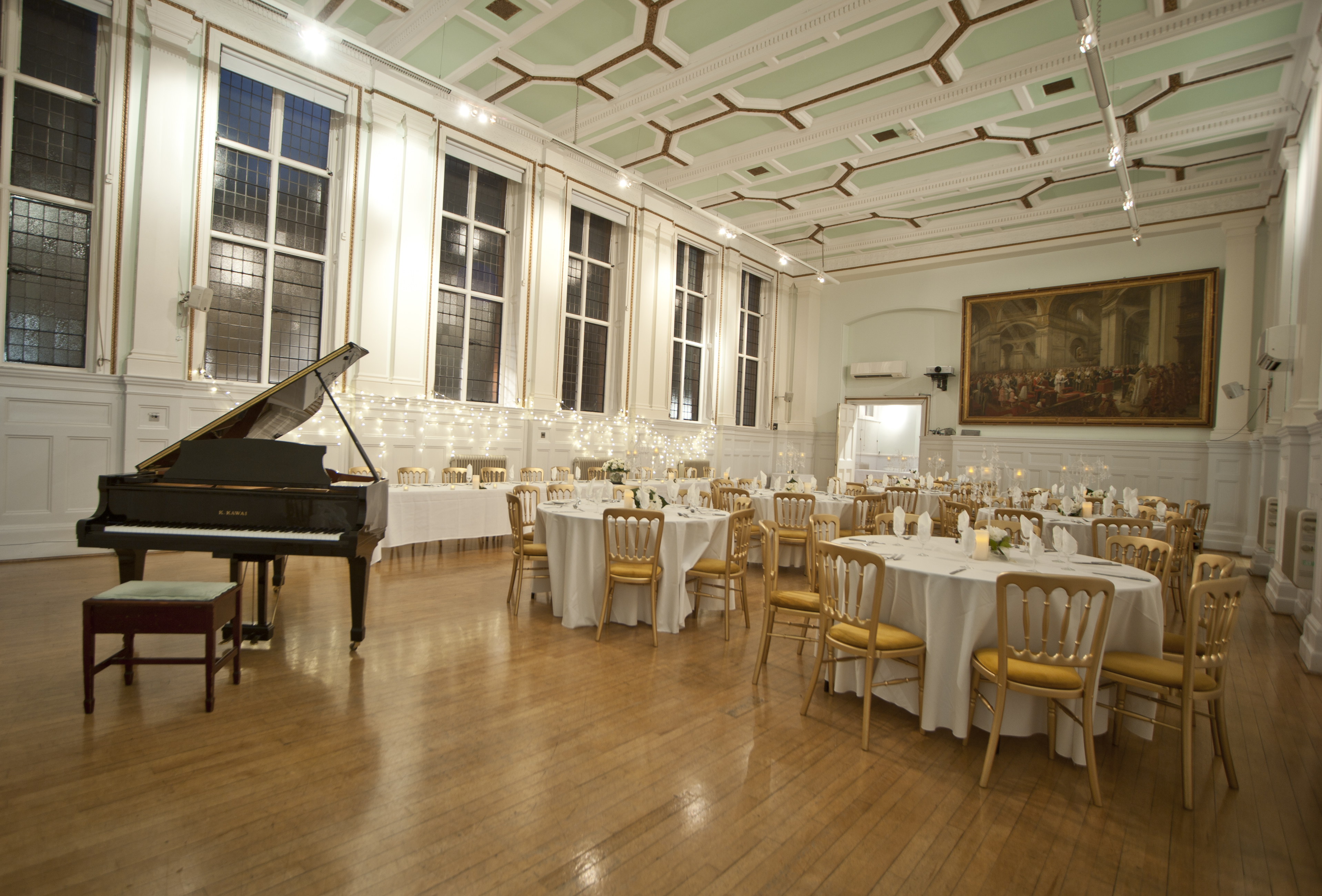 Elegant Bridewell Hall event space with grand piano, perfect for weddings and receptions.