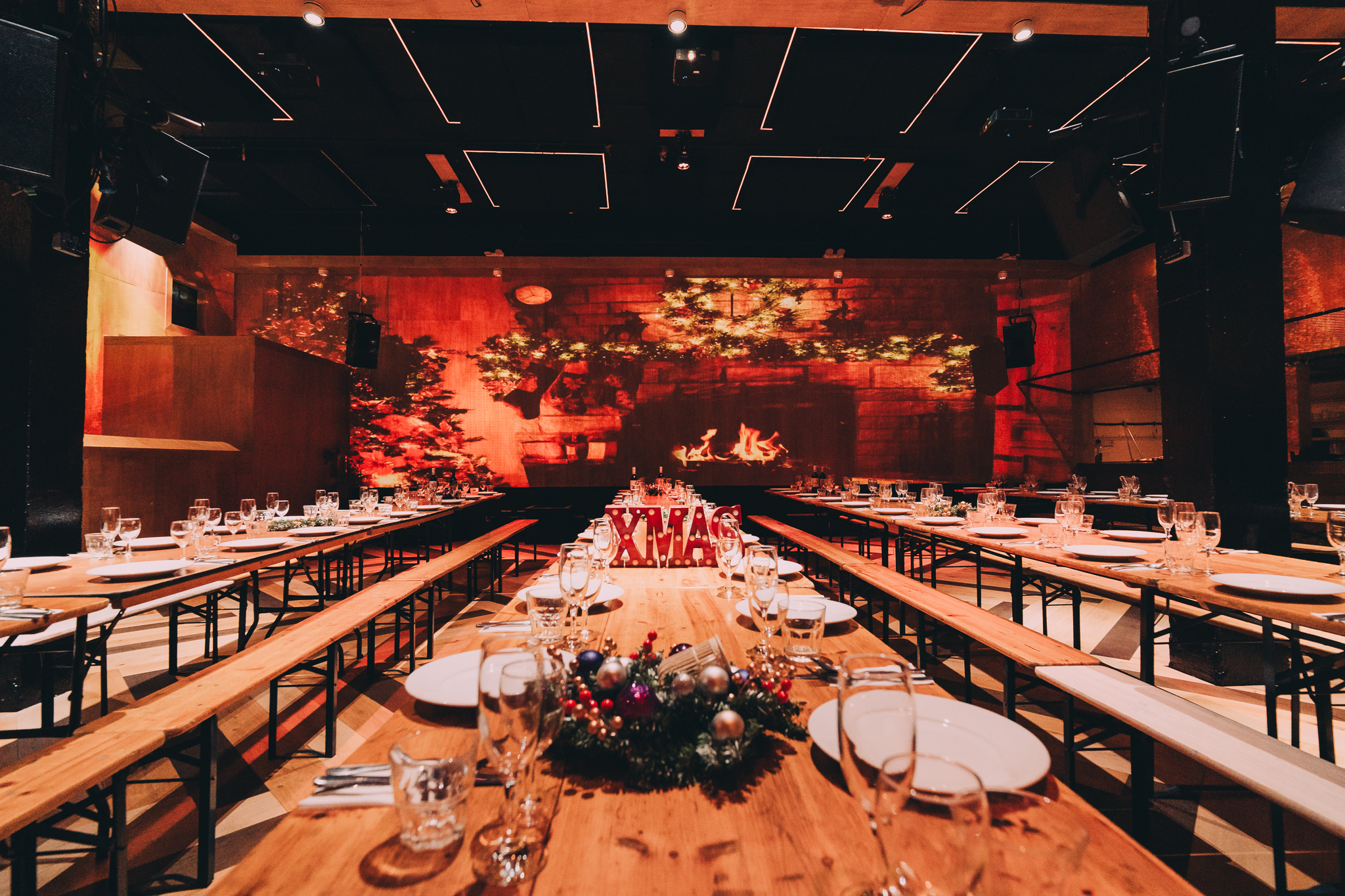 Event space 90 Hideout in Hackney Wick, featuring communal tables for networking banquets.