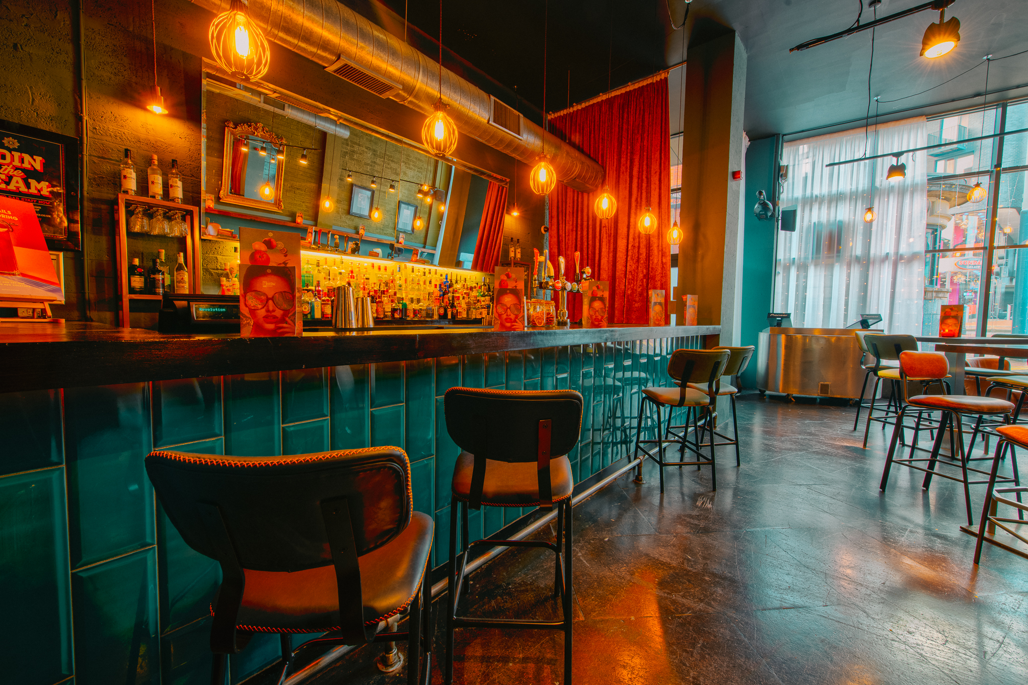 Stylish bar area in Hidden Bar, Revolution Sheffield for networking events and gatherings.