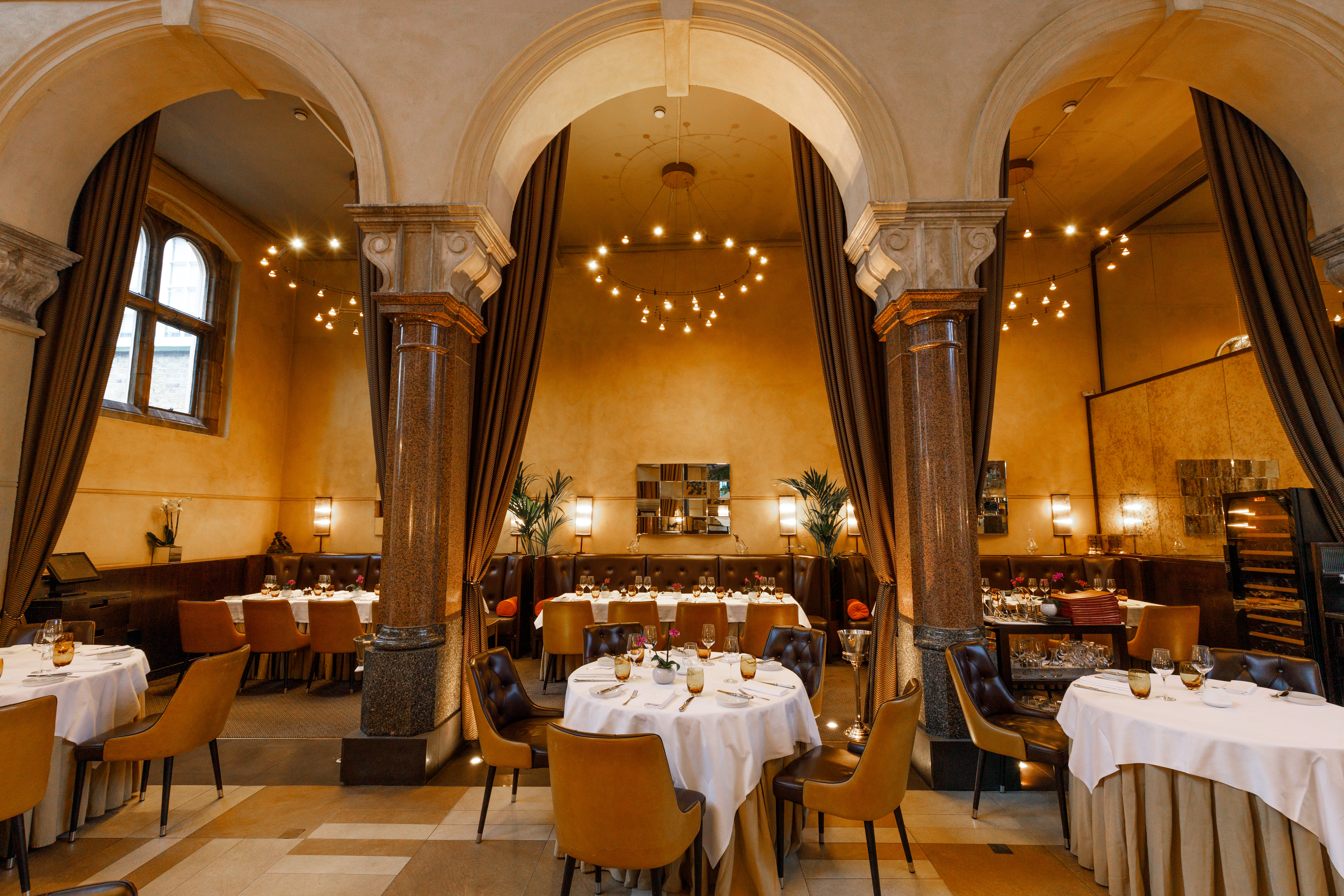 Elegant dining space at Galvin La Chapelle for upscale events and corporate dinners.