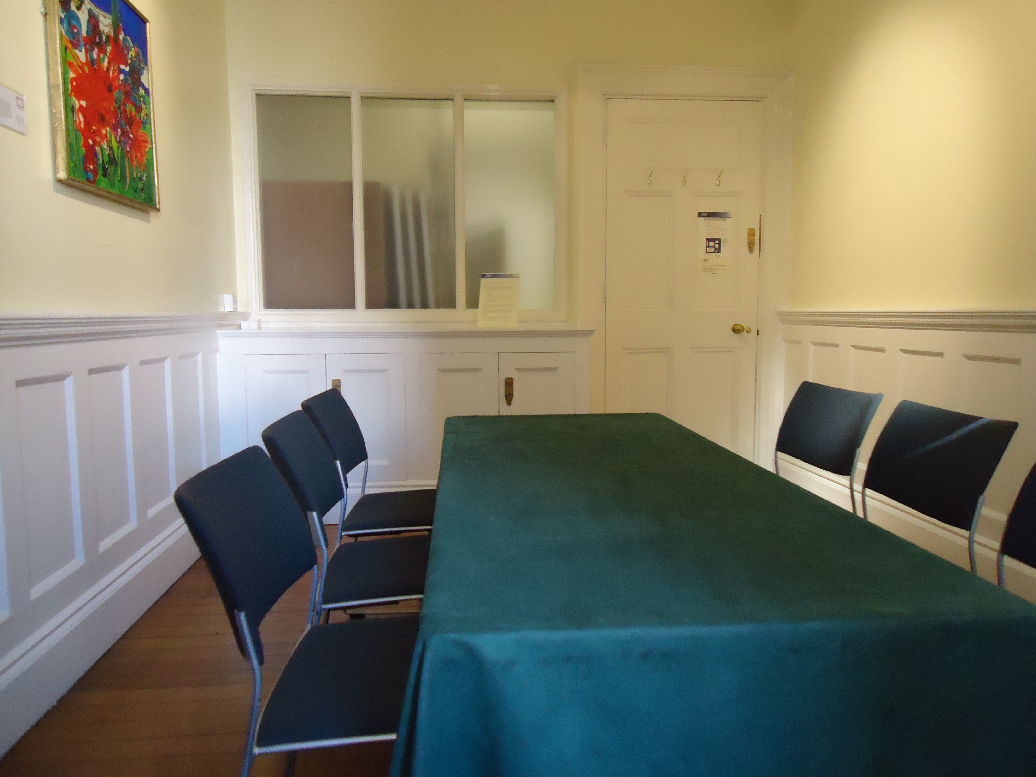 Caxton Room at St Bride Foundation, green tablecloth, ideal for workshops and meetings.