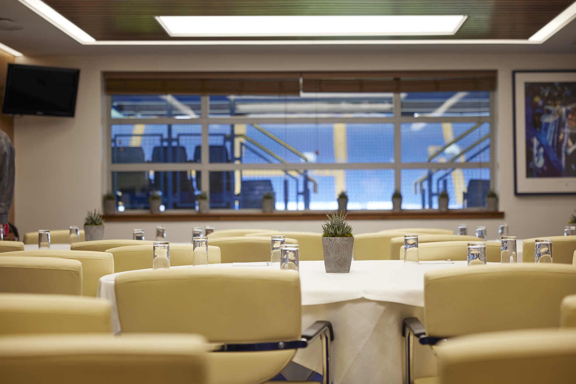 Vialli Suite at Chelsea FC: elegant meeting room with natural light for workshops.