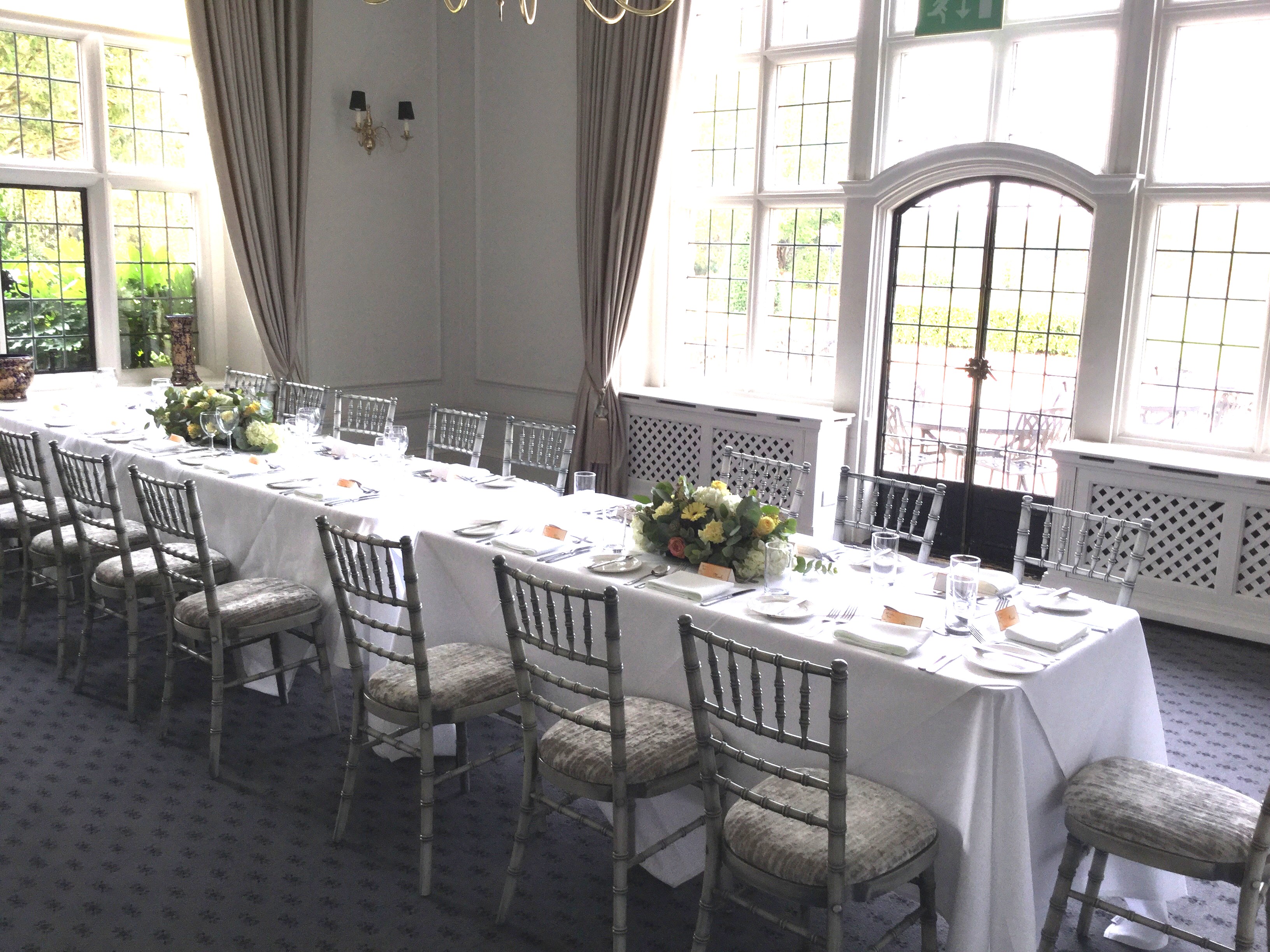 Elegant banquet table in Boardroom Suite, Greenwoods Hotel & Spa for corporate events.