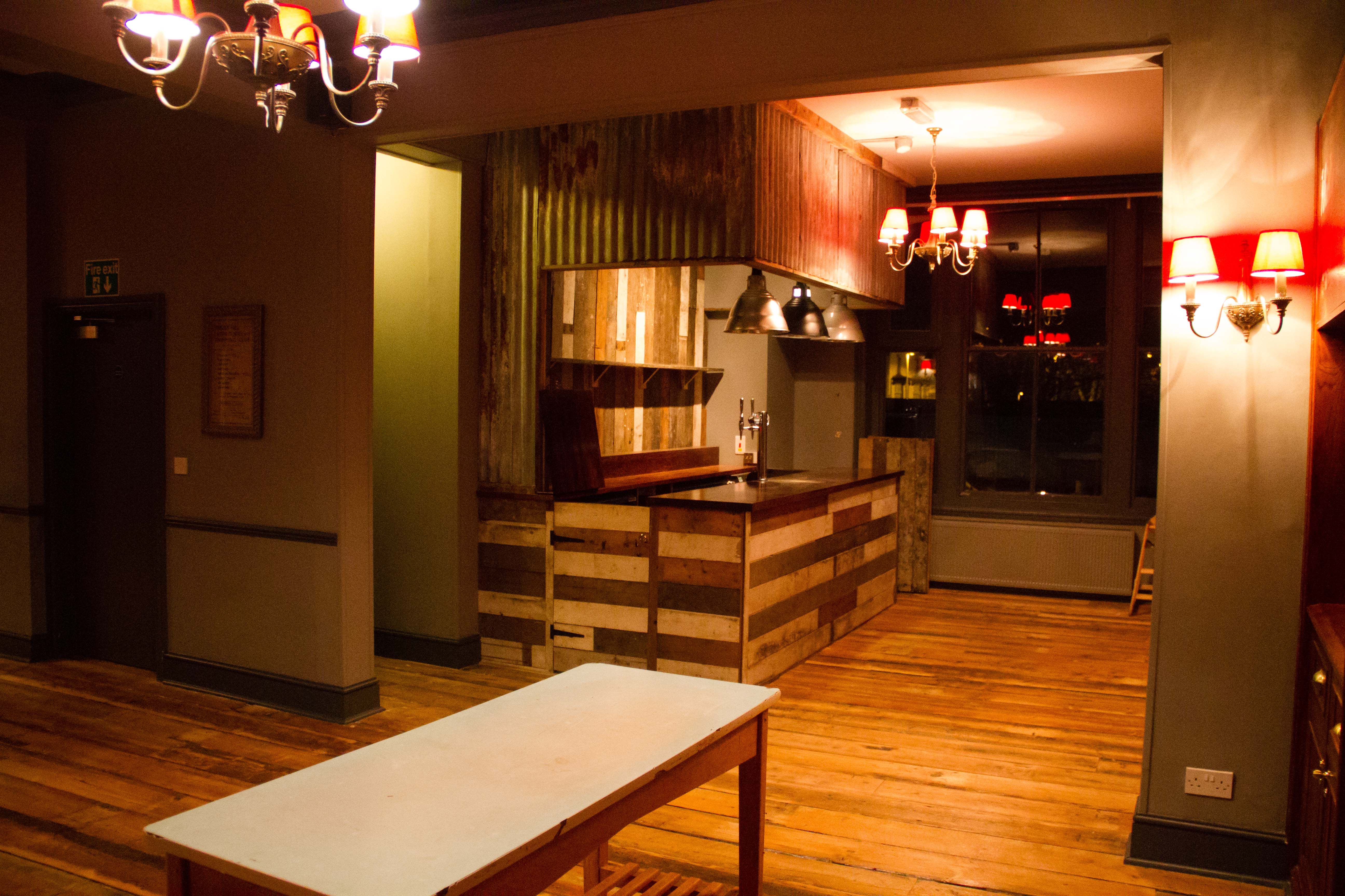 Versatile event space with rustic charm, ideal for gatherings and meetings at The Loft.