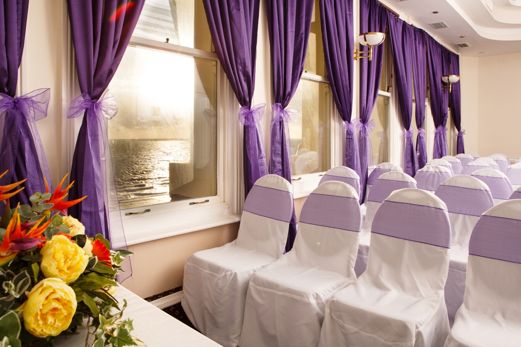 Coast View 1 meeting space with elegant chairs, perfect for corporate events or weddings.