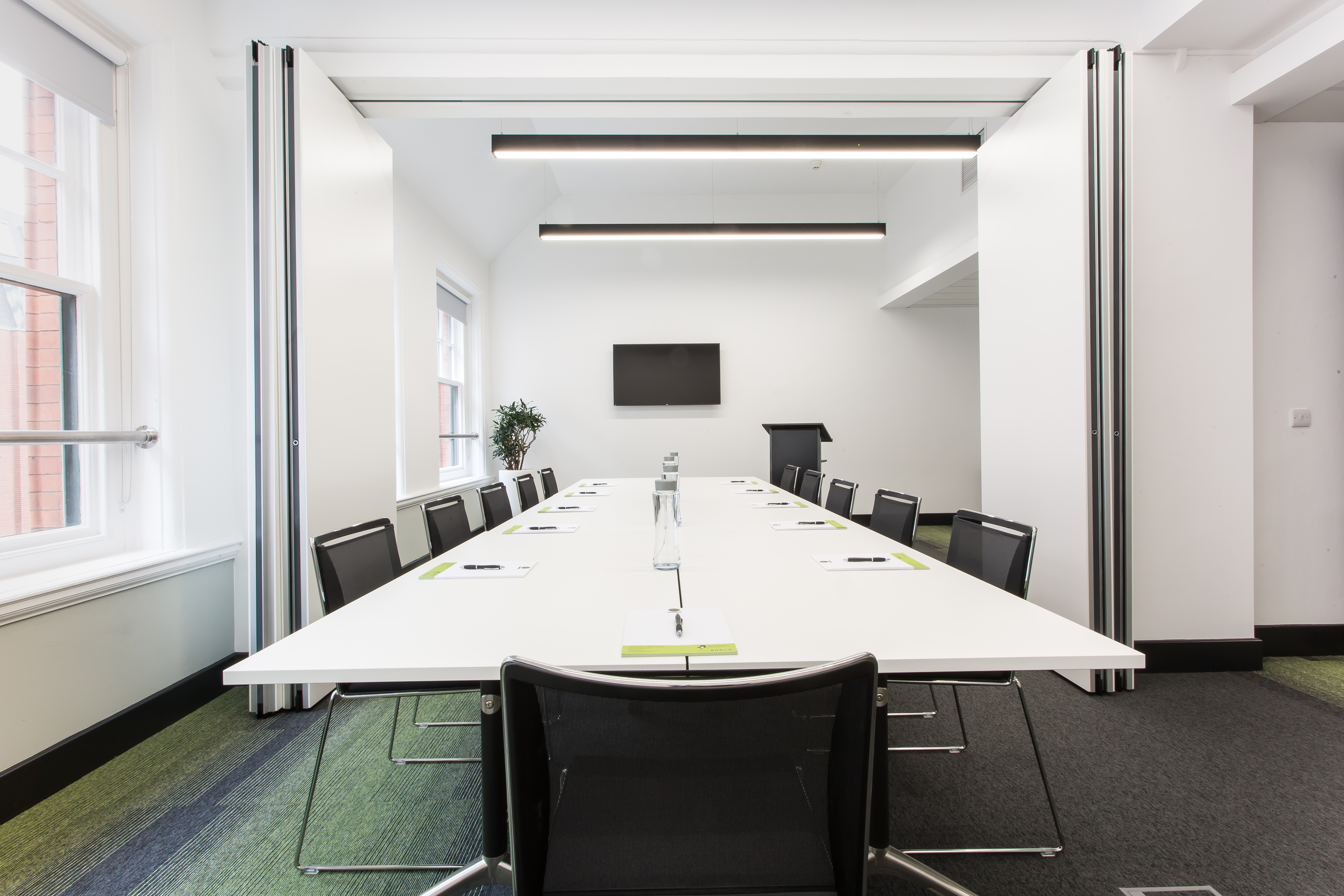 Modern Gaskell Room with sleek table, ideal for professional meetings and events.