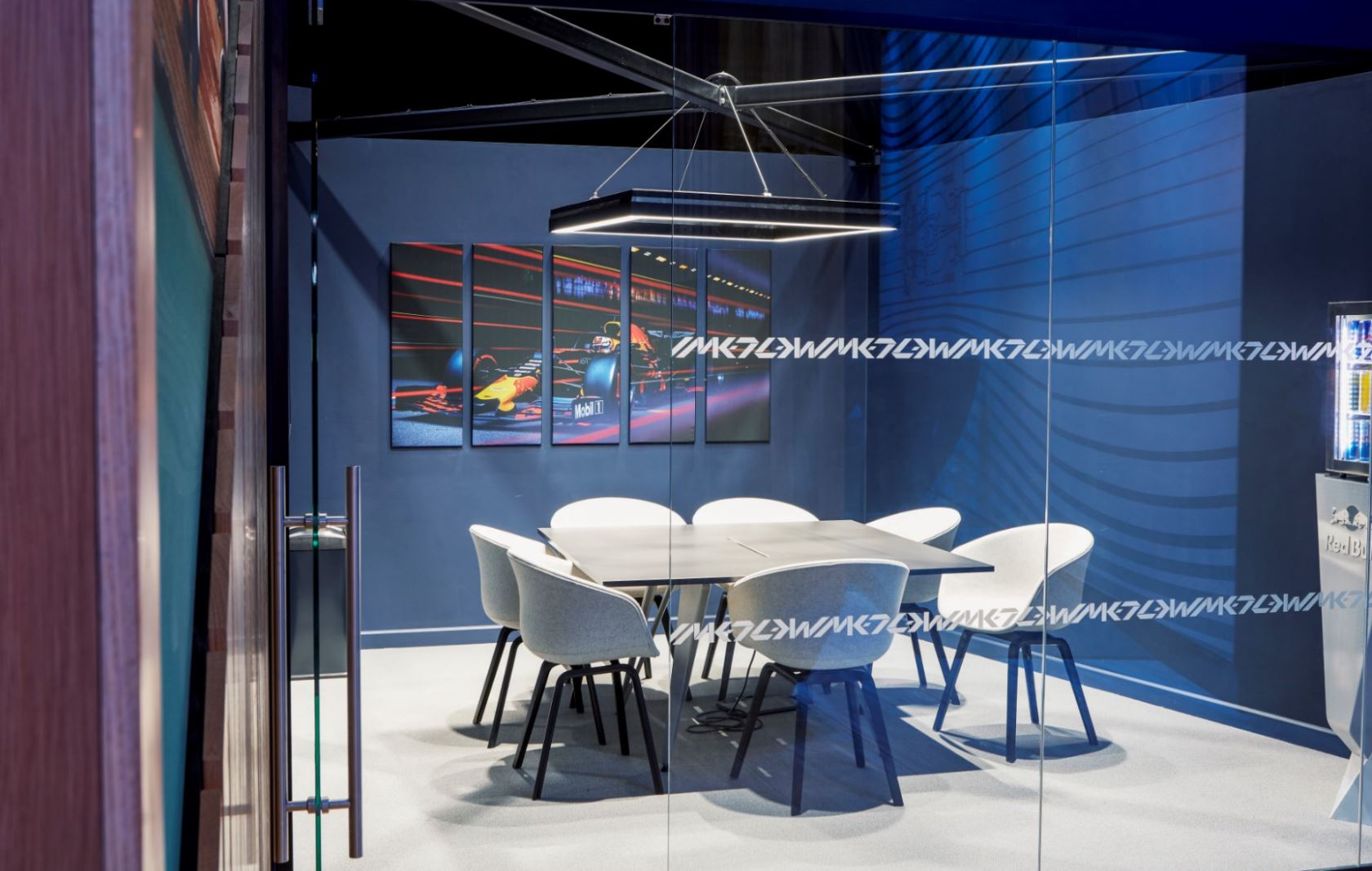 Modern MK-7 Meeting Room at Red Bull Racing, ideal for brainstorming and client meetings.