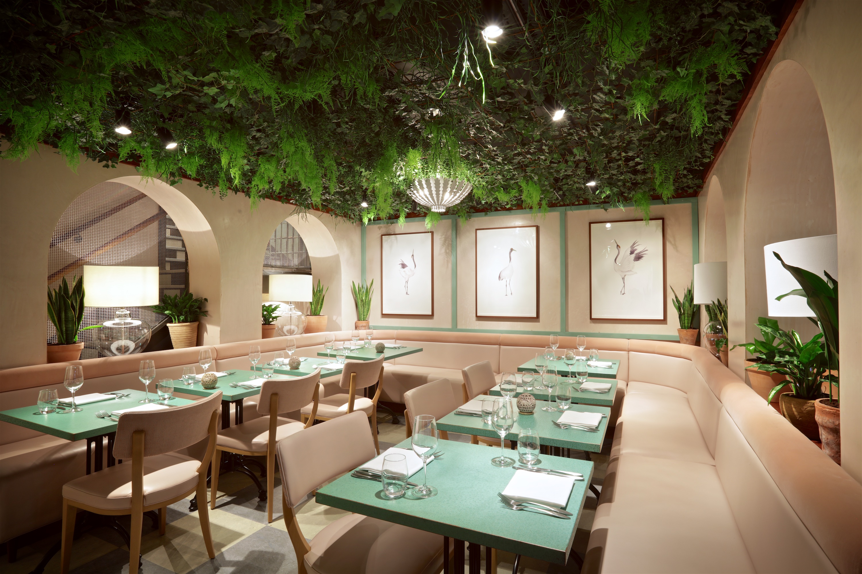 Elegant dining space in Kanishka Mayfair's Garden Room for events and gatherings. - Banner
