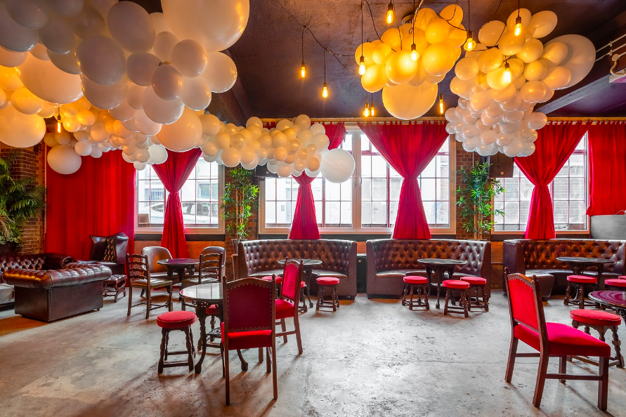 Vibrant U7 Lounge event space with cozy seating and elegant decor for gatherings. - Banner