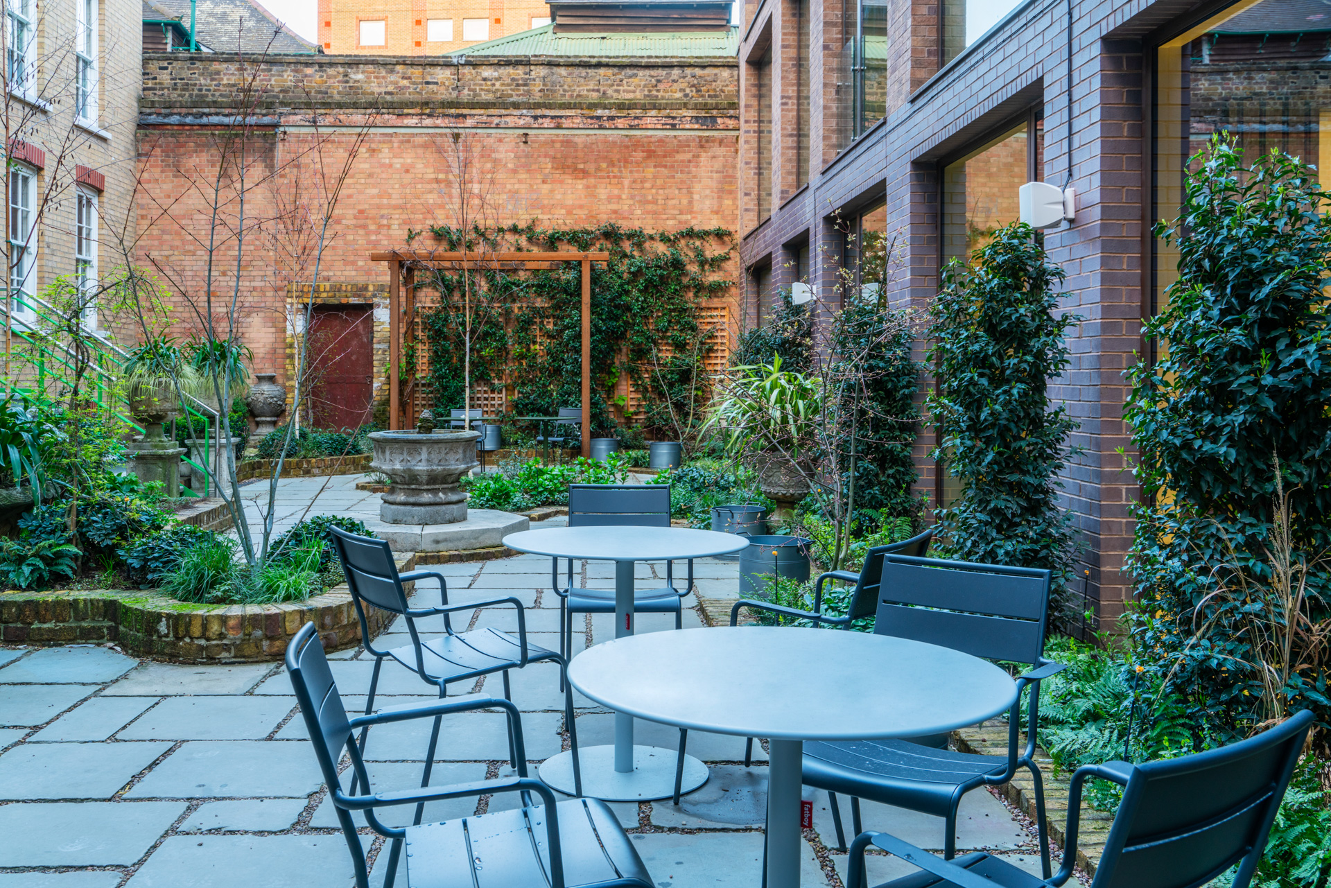 Charming outdoor courtyard at People's Mission Hall for networking events and casual gatherings.