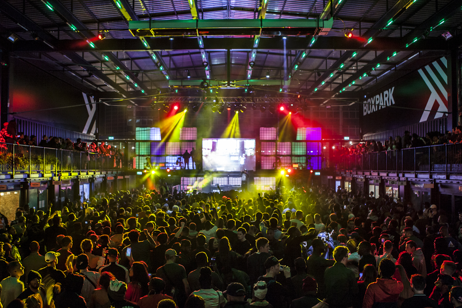 Vibrant event space at Boxpark Croydon for concerts and corporate celebrations.