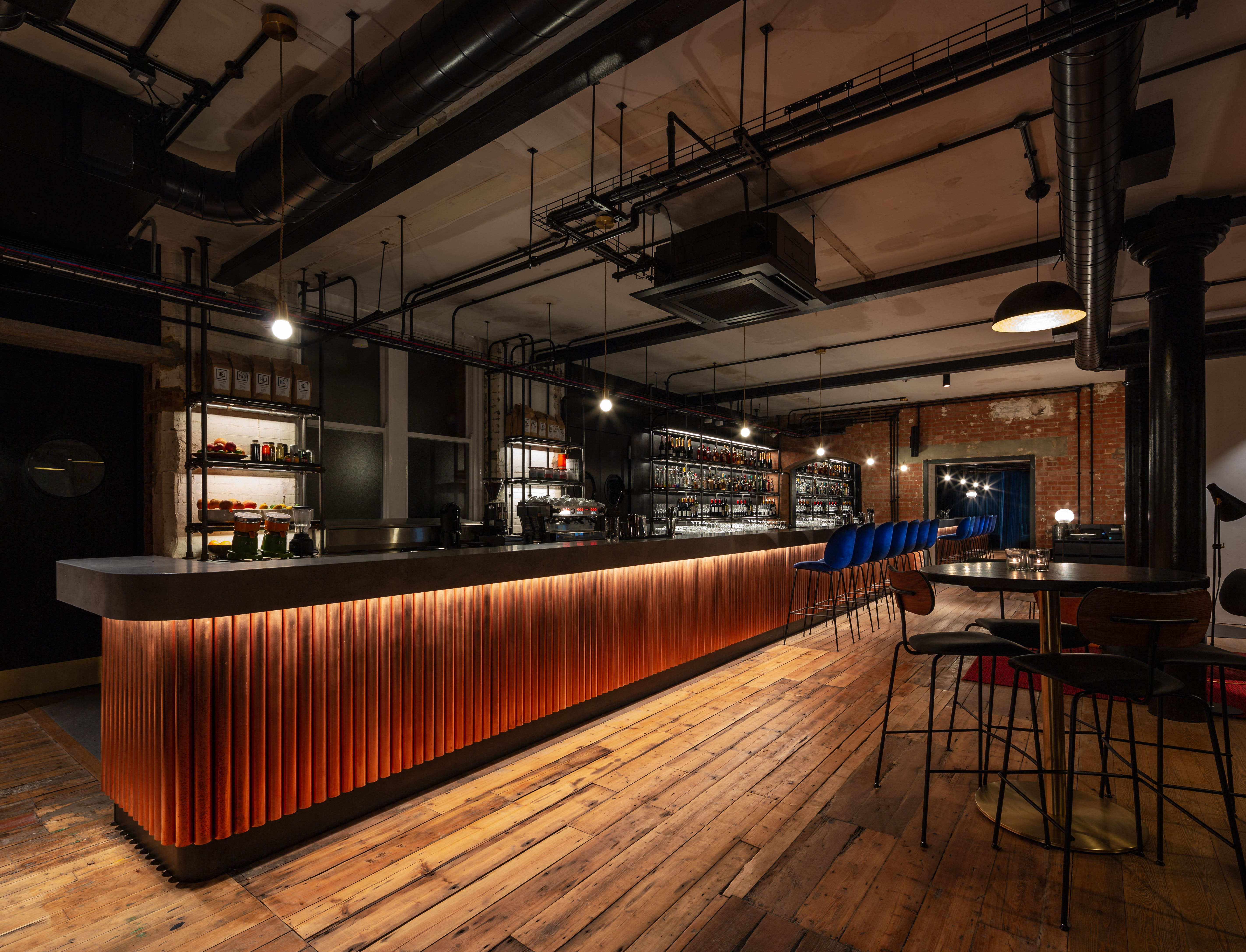 Industrial-chic bar at The Ministry, ideal for corporate networking receptions.
