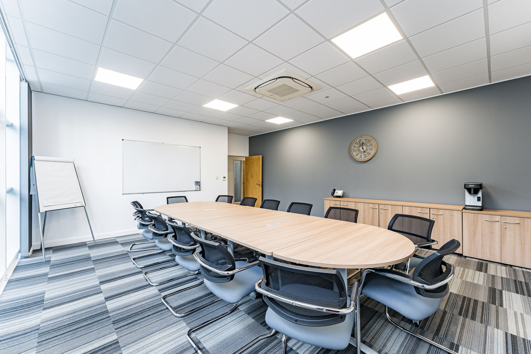 Modern conference room in Baskerville Suite, UBC Birmingham, ideal for meetings and events.