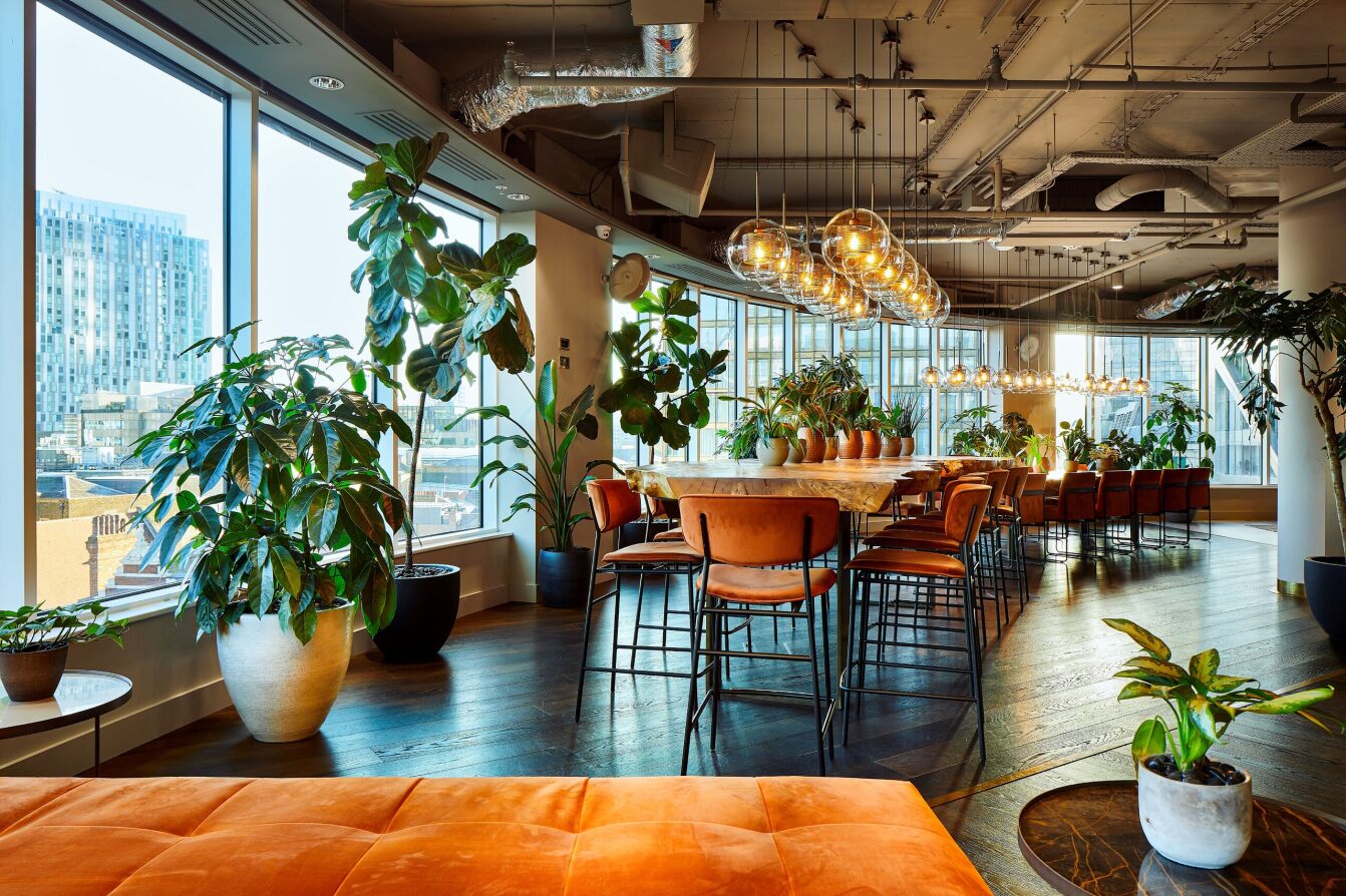 Elegant Cafe Lounge event space with natural light, perfect for networking gatherings.